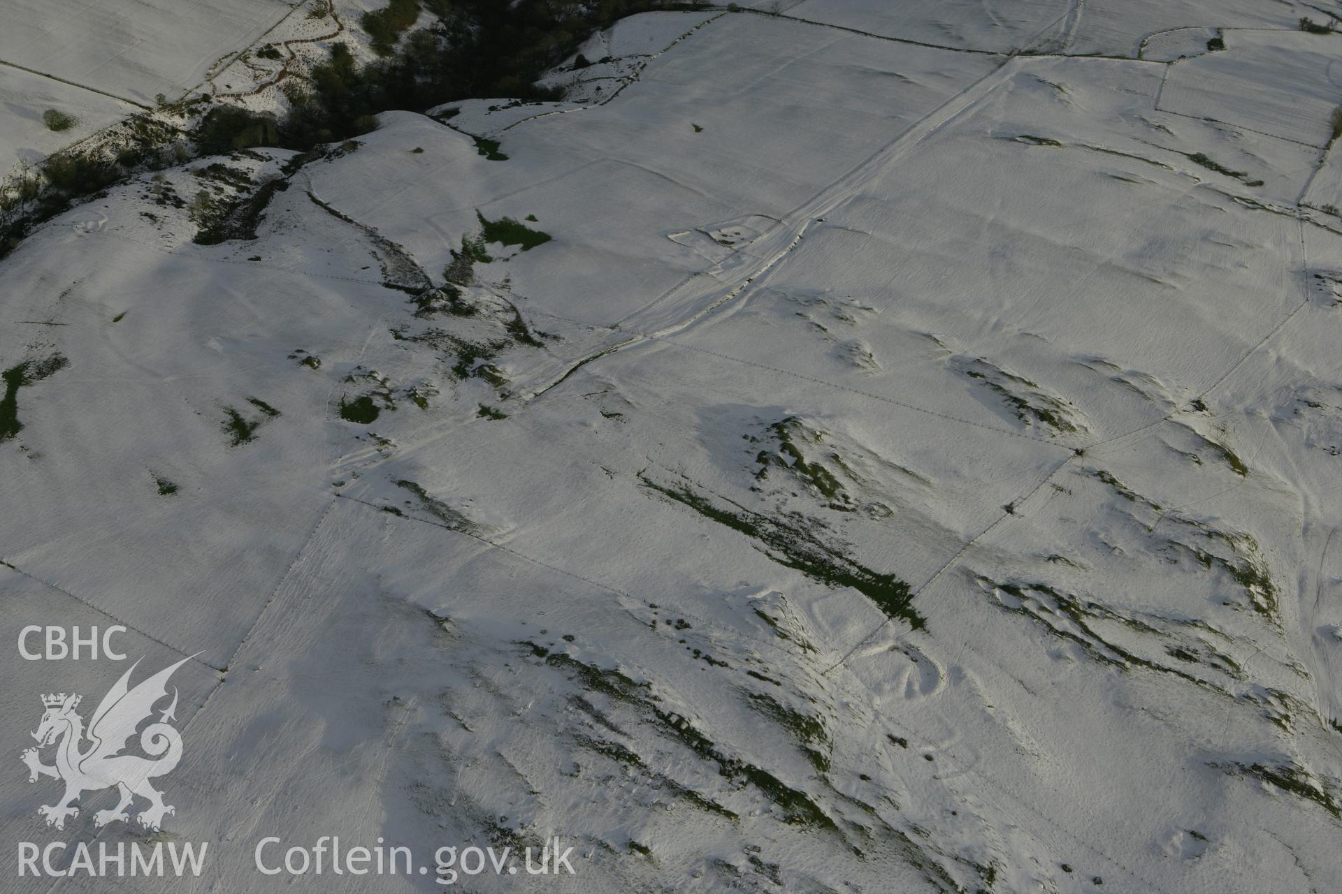 RCAHMW colour oblique photograph of Cefn Goleu enclosure 2, view looking south. Taken by Toby Driver on 18/12/2011.