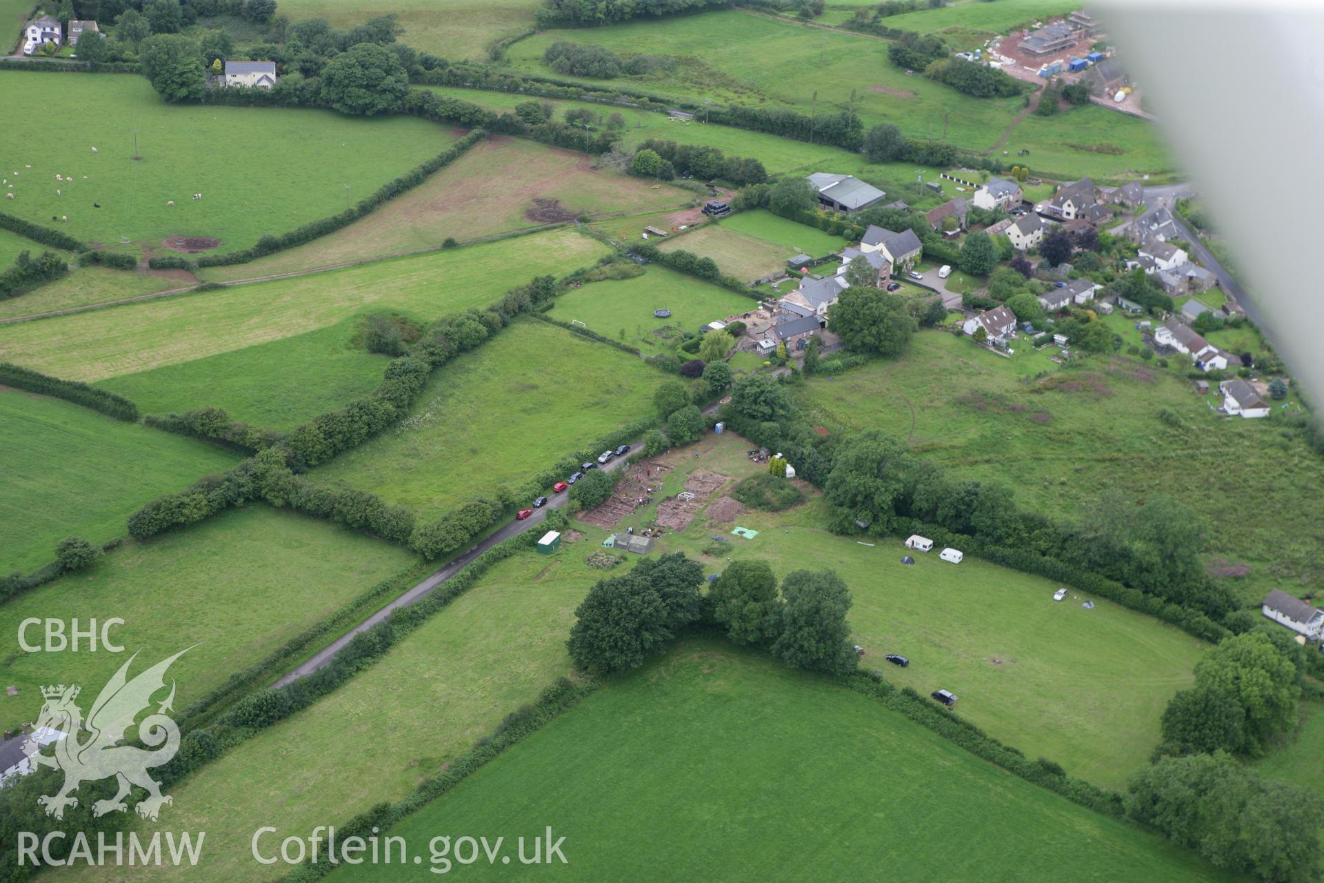 RCAHMW colour oblique photograph of Trellech shrunken medieval village, excavations. Taken by Toby Driver on 20/07/2011.