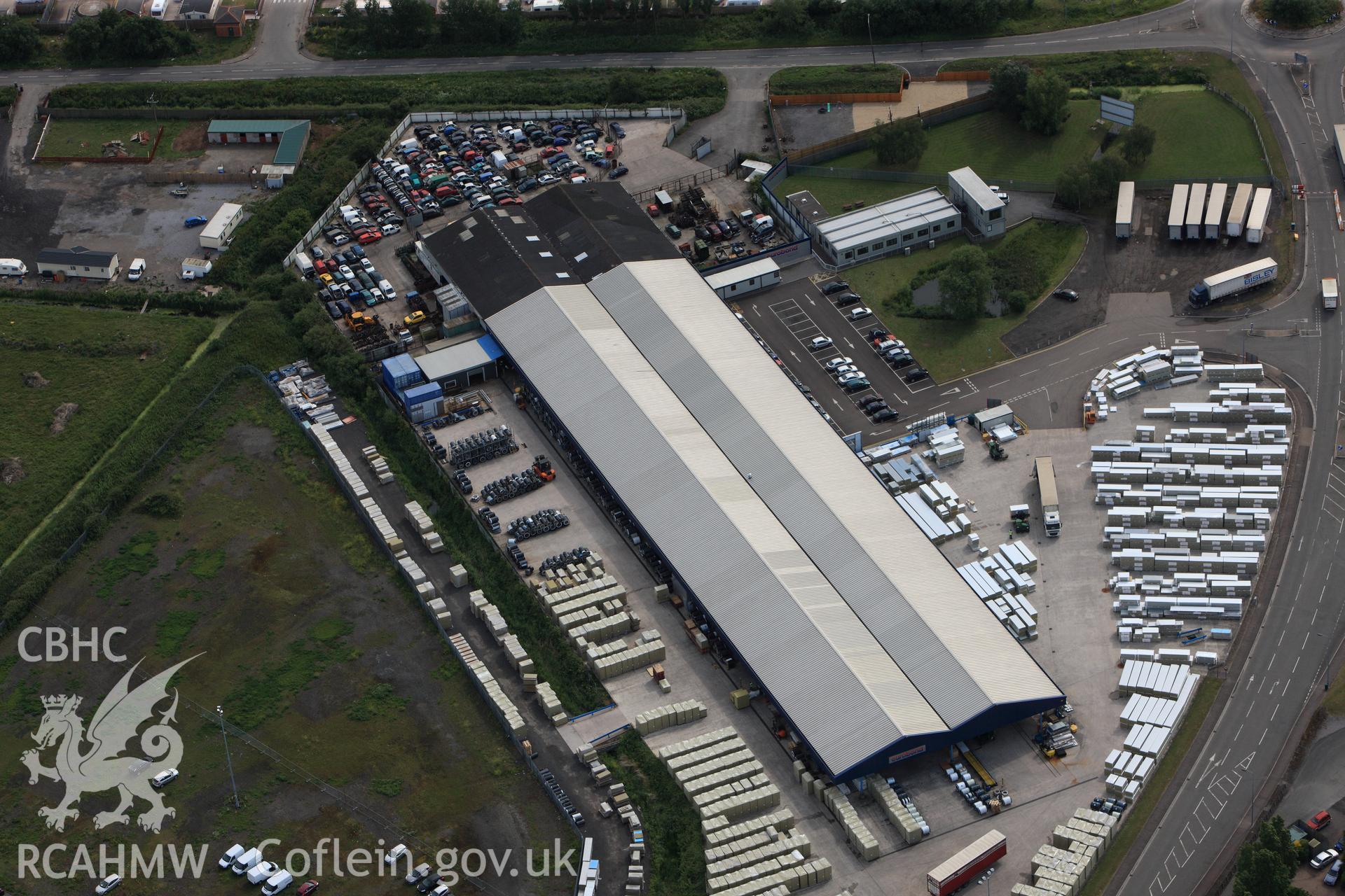 RCAHMW colour oblique photograph of Wentloog industrial park dispersal sheds. Taken by Toby Driver on 13/06/2011.