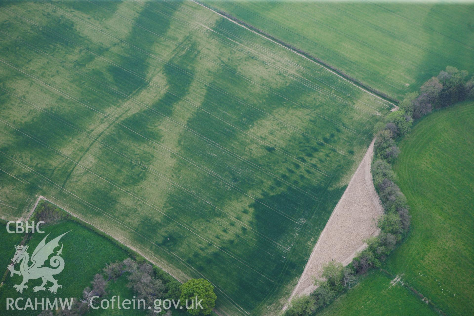 RCAHMW colour oblique photograph of Rossers Bridge, parallel pit alignment. Taken by Toby Driver on 26/04/2011.