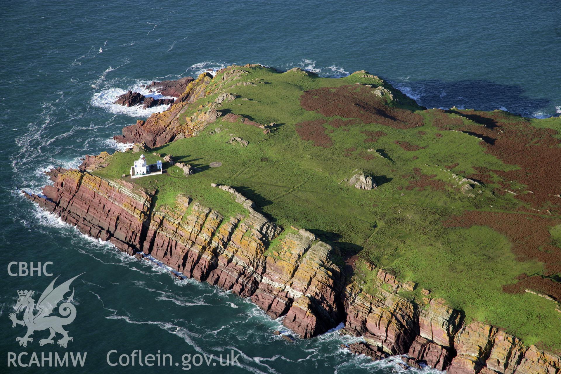 RCAHMW colour oblique photograph of Skokholm Island and lighthouse, viewed from the south. Taken by O. Davies & T. Driver on 22/11/2013.