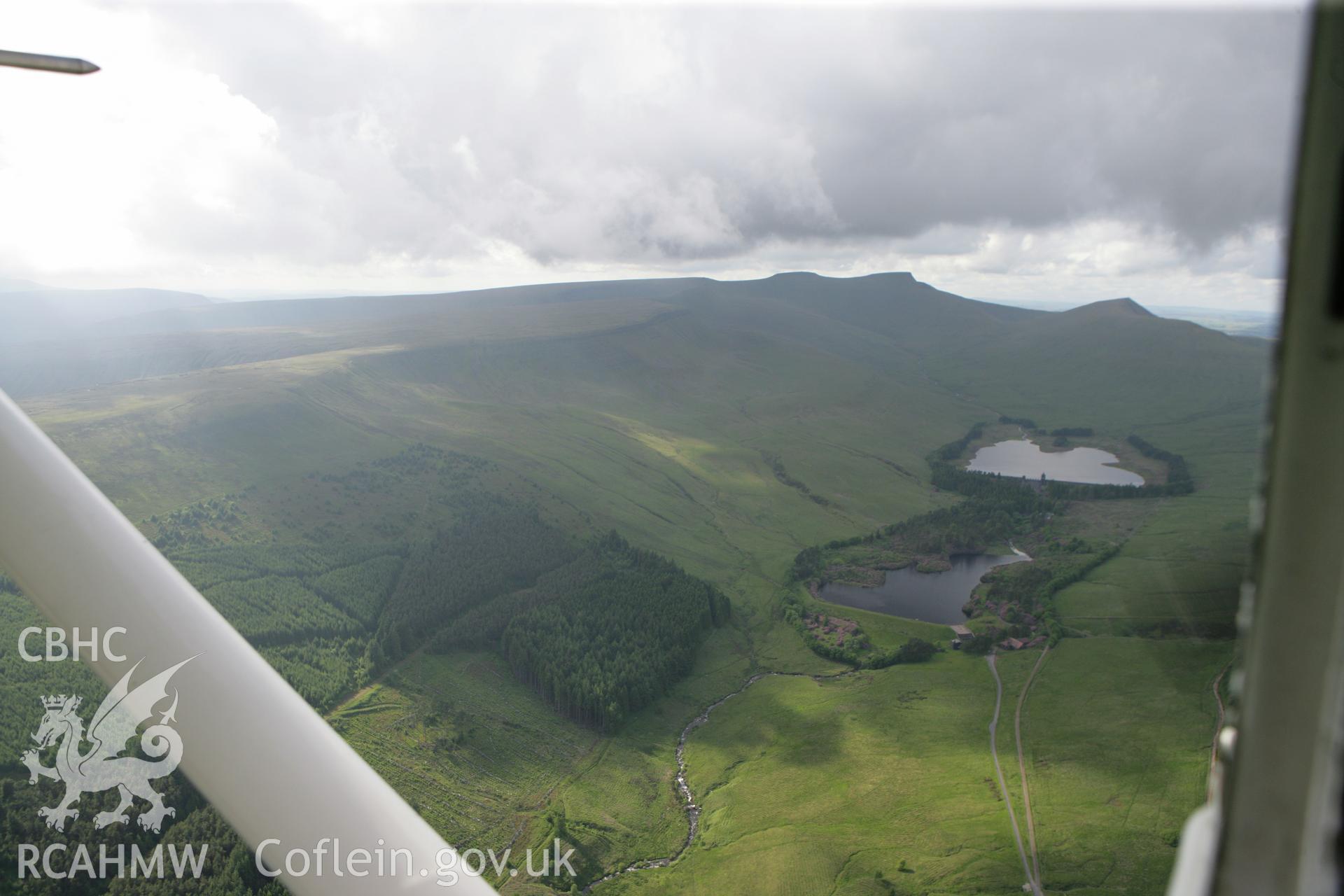 RCAHMW colour oblique photograph of Upper Neuadd reservoir, Taff Fechan. Taken by Toby Driver on 13/06/2011.