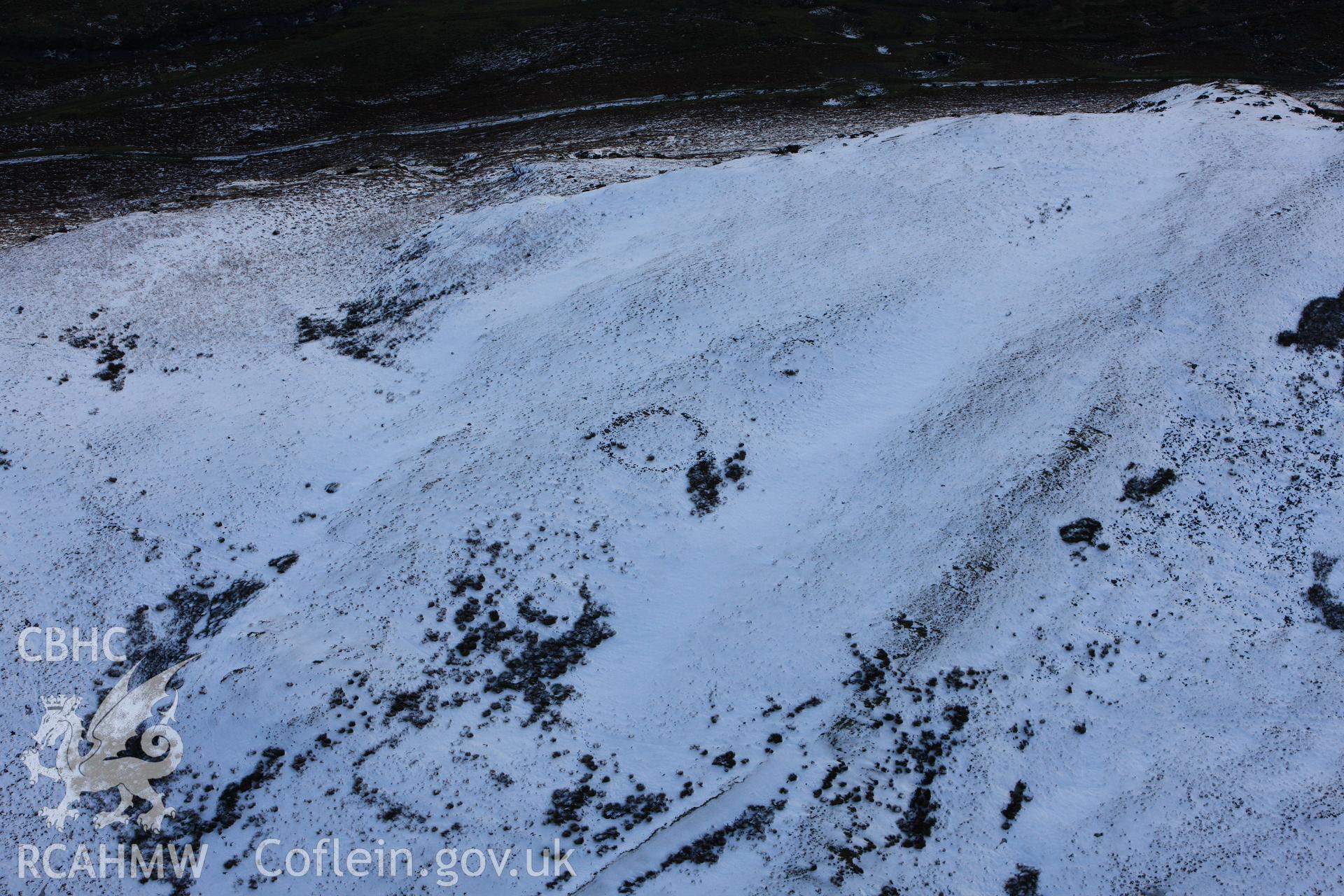RCAHMW colour oblique photograph of Craig Llysiau enclosure. Taken by Toby Driver on 18/12/2011.