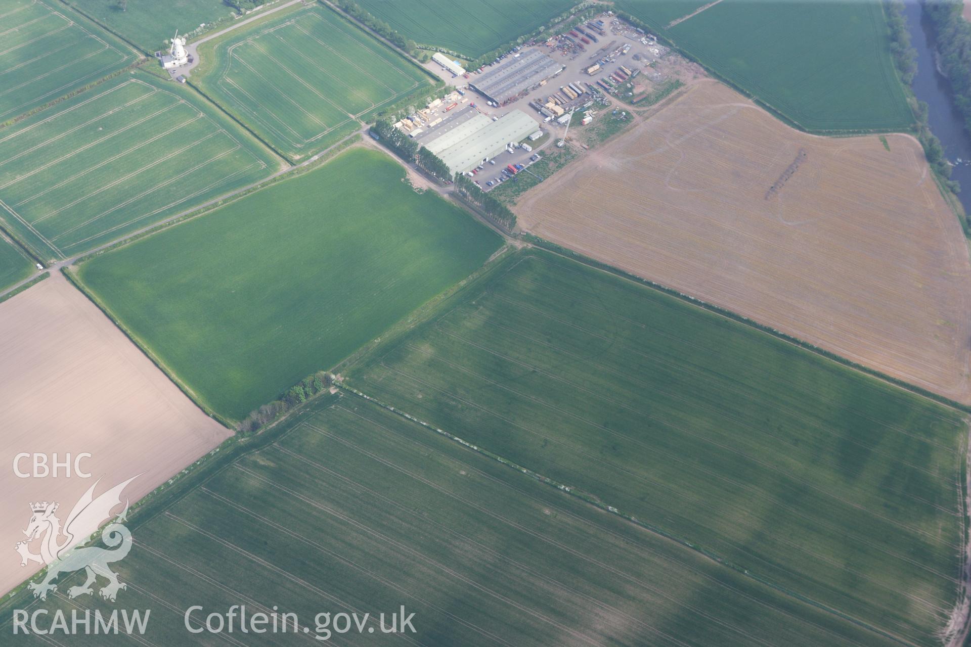 RCAHMW colour oblique photograph of Llancayo Farm Roman marching camp. Taken by Toby Driver on 26/04/2011.