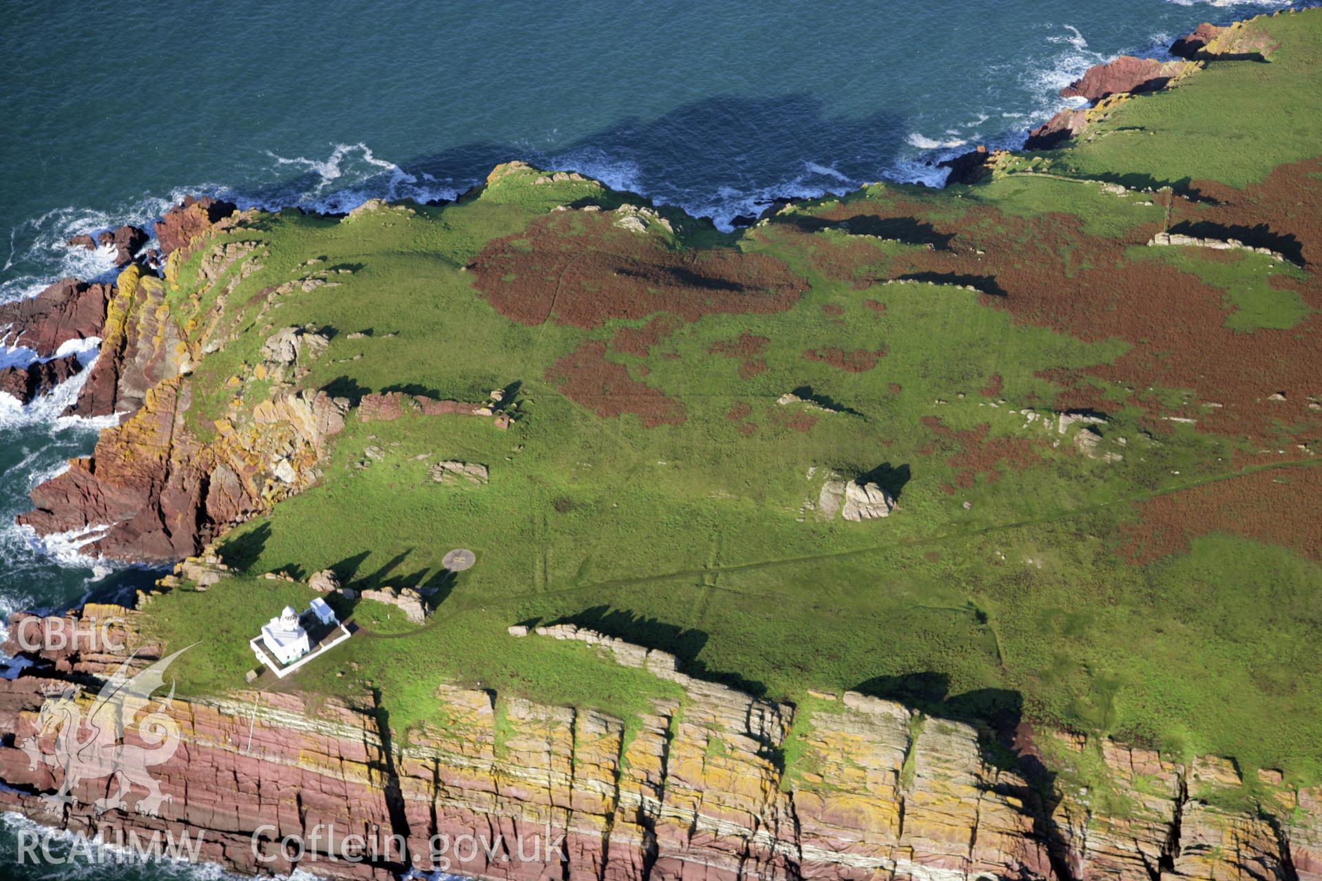 RCAHMW colour oblique photograph of Skokholm Island lighthouse, viewed from the south. Taken by O. Davies & T. Driver on 22/11/2013.