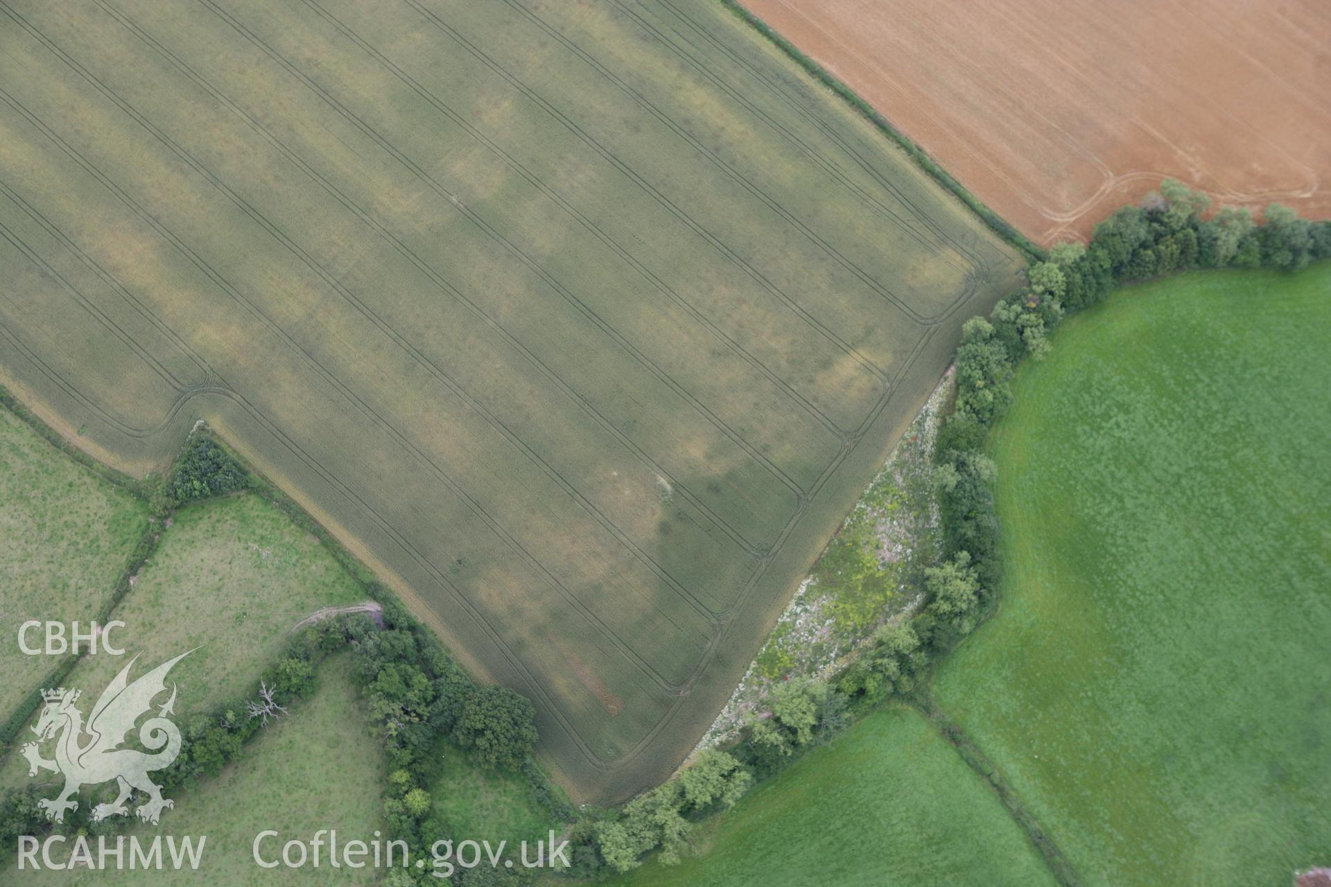 RCAHMW colour oblique photograph of Rossers Bridge, cropmarks of pit cluster. Taken by Toby Driver on 20/07/2011.