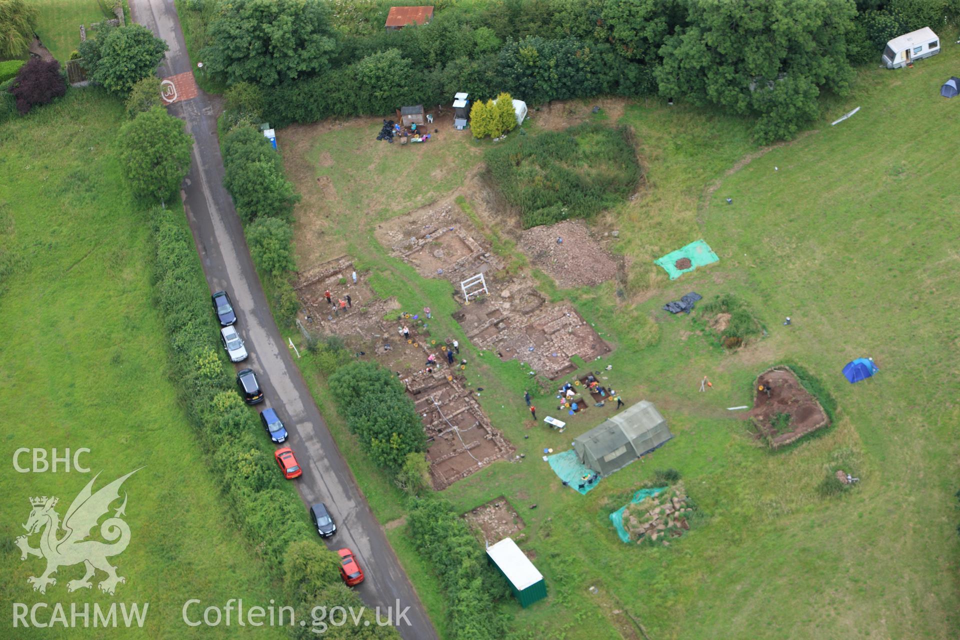 RCAHMW colour oblique photograph of Trellech shrunken medieval village, excavations. Taken by Toby Driver on 20/07/2011.