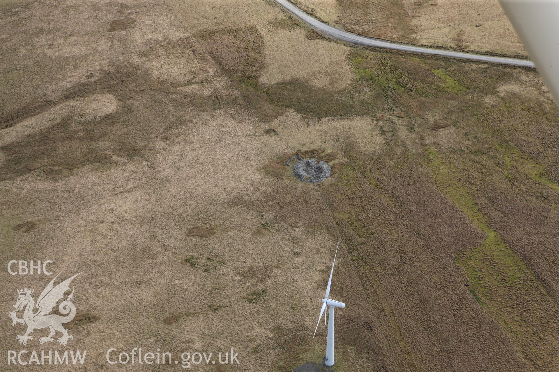 RCAHMW colour oblique photograph of 	Twr-Gwyn Mawr Cairn. Taken by Toby Driver on 22/03/2011.