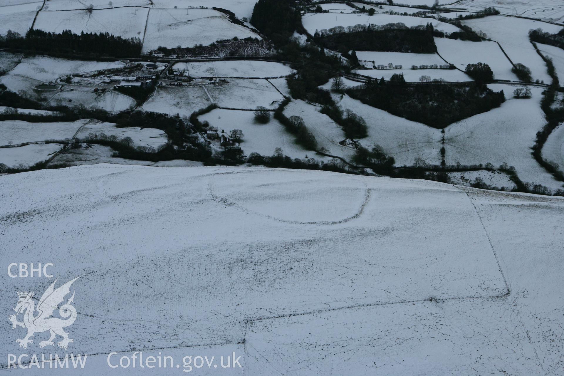 RCAHMW colour oblique photograph of Llyssin hillfort, SAM recommendation. Taken by Toby Driver on 18/12/2011.