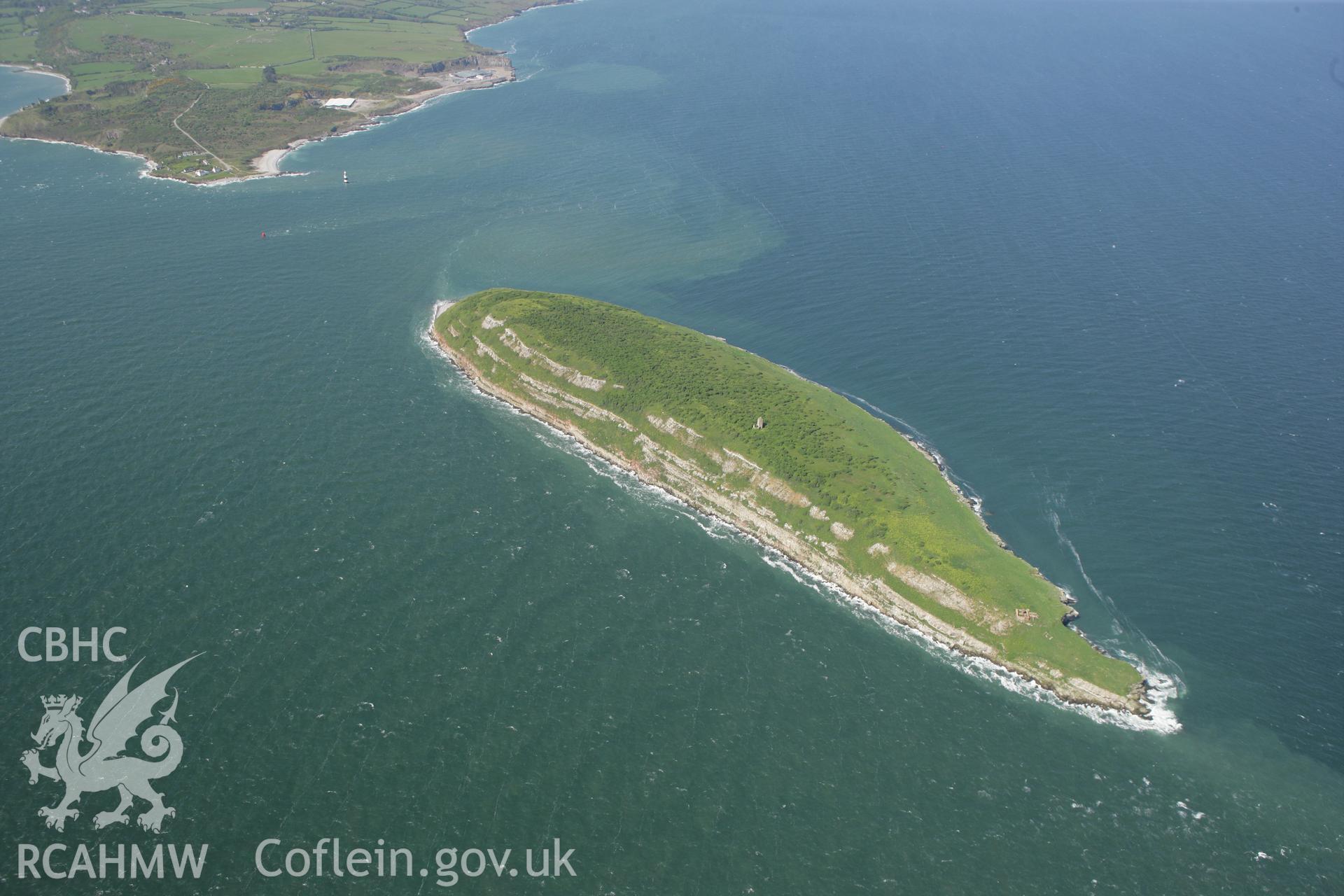 RCAHMW colour oblique photograph of Puffin Island, with cell of Penmon Priory. Taken by Toby Driver on 03/05/2011.