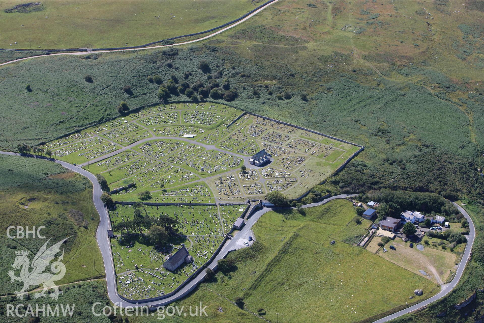 RCAHMW colour oblique photograph of Great Orme Cemetery, and St Tudno's Church. Taken by Toby Driver on 20/07/2011.