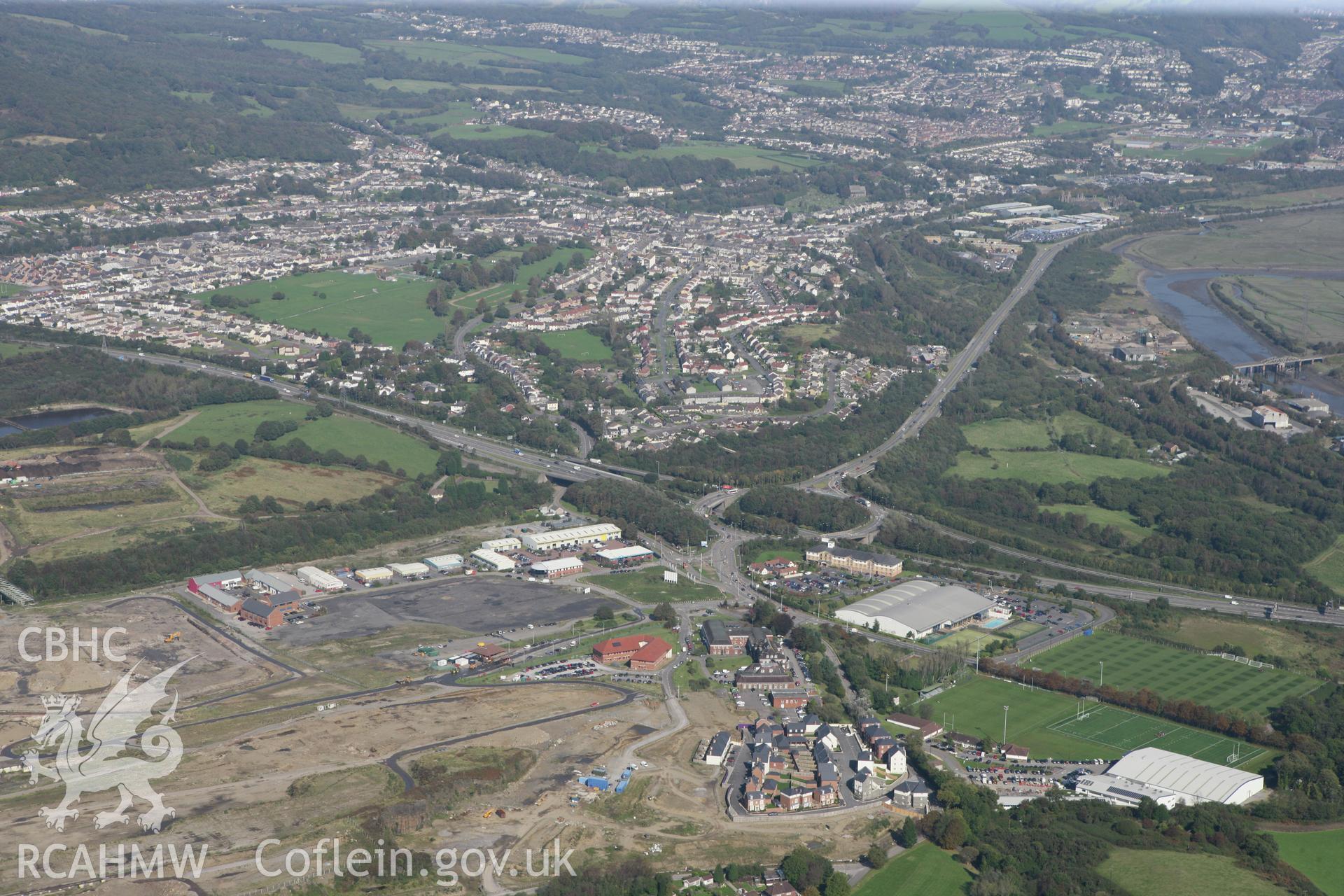 RCAHMW colour oblique photograph of Llandarcy oil refinery, looking towards M4 Junction 43. Taken by Toby Driver and Oliver Davies on 28/09/2011.