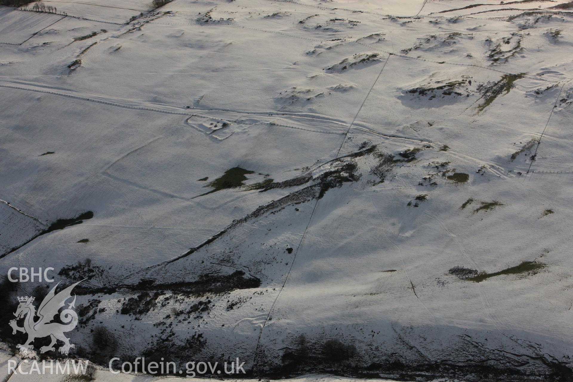 RCAHMW colour oblique photograph of Cefn Goleu enclosure 1, view looking south. Taken by Toby Driver on 18/12/2011.