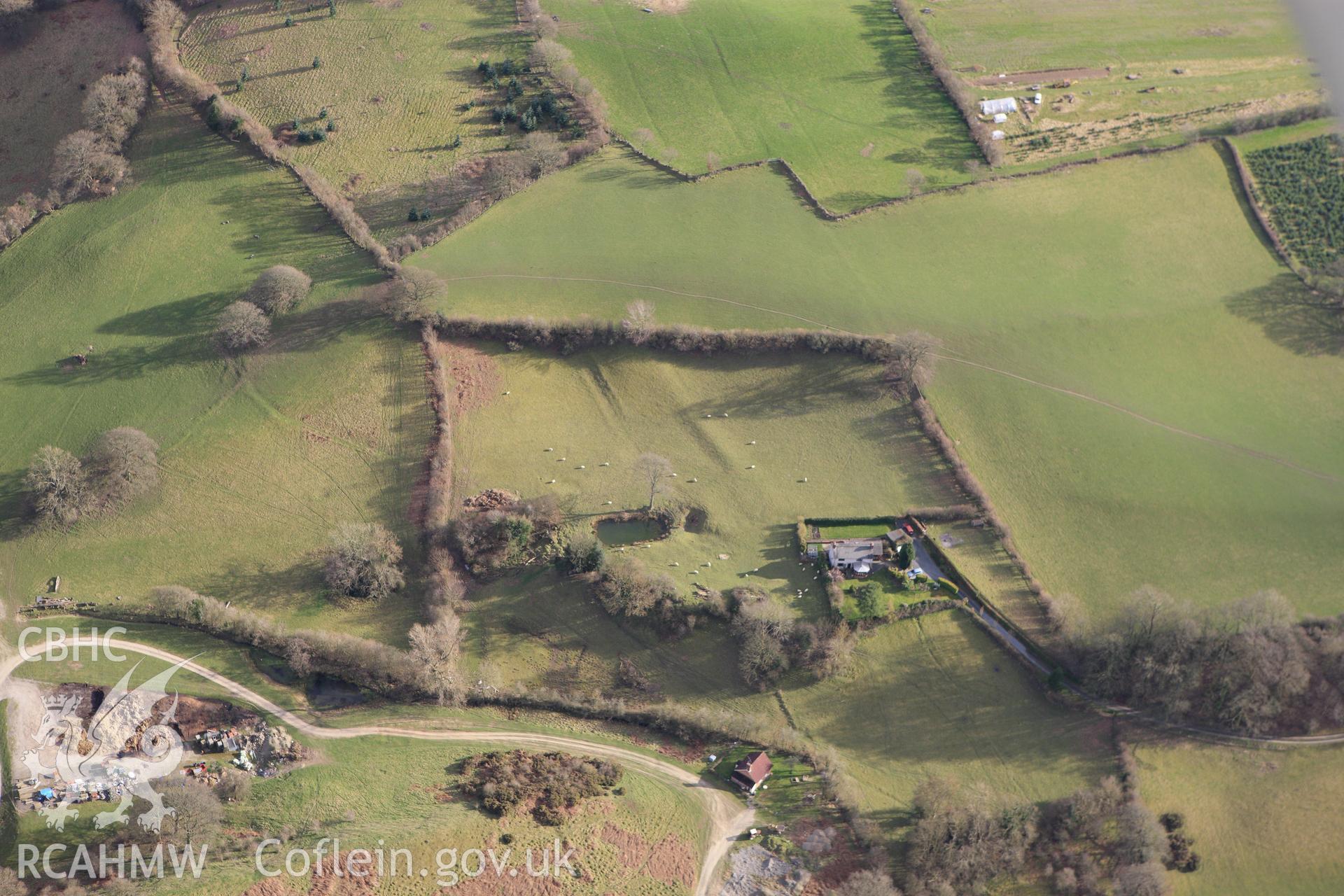 RCAHMW colour oblique photograph of Neuadd-Fraith, Aberbechan. Taken by Toby Driver on 22/03/2011.
