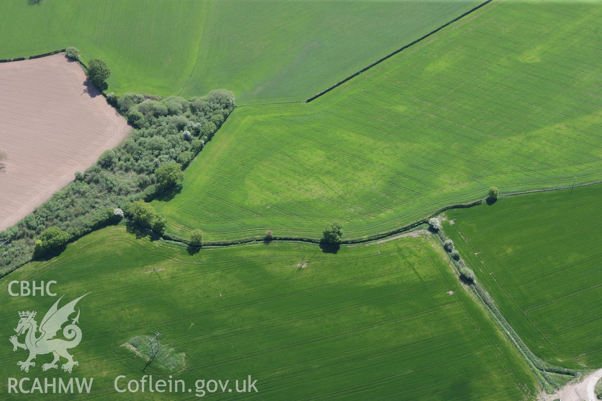 RCAHMW colour oblique photograph of Gerwyn-Fechan Round Barrow Cemetery. Taken by Toby Driver on 03/05/2011.