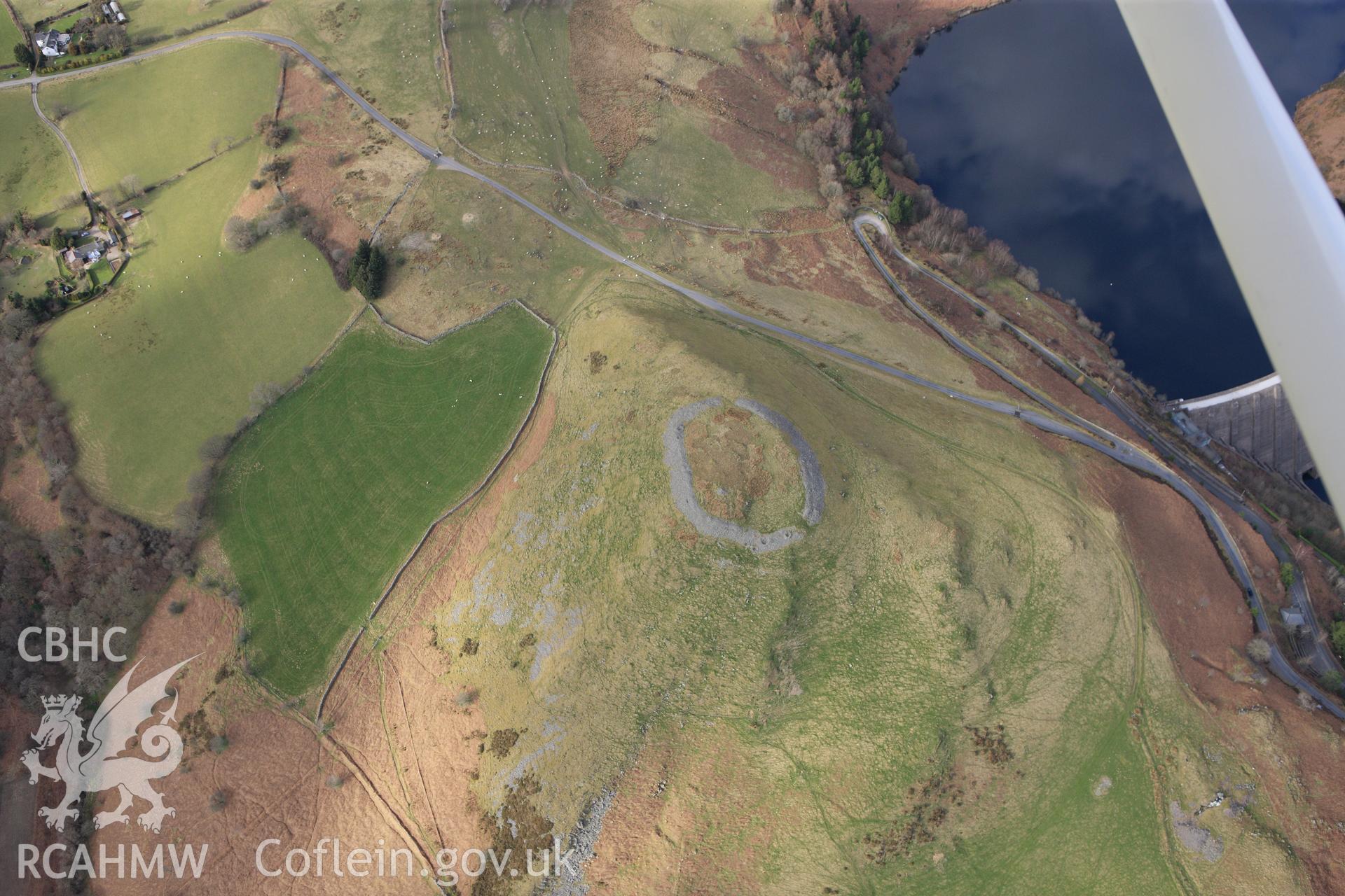 RCAHMW colour oblique photograph of Pen-y-Gaer, Llanidloes. Taken by Toby Driver on 22/03/2011.