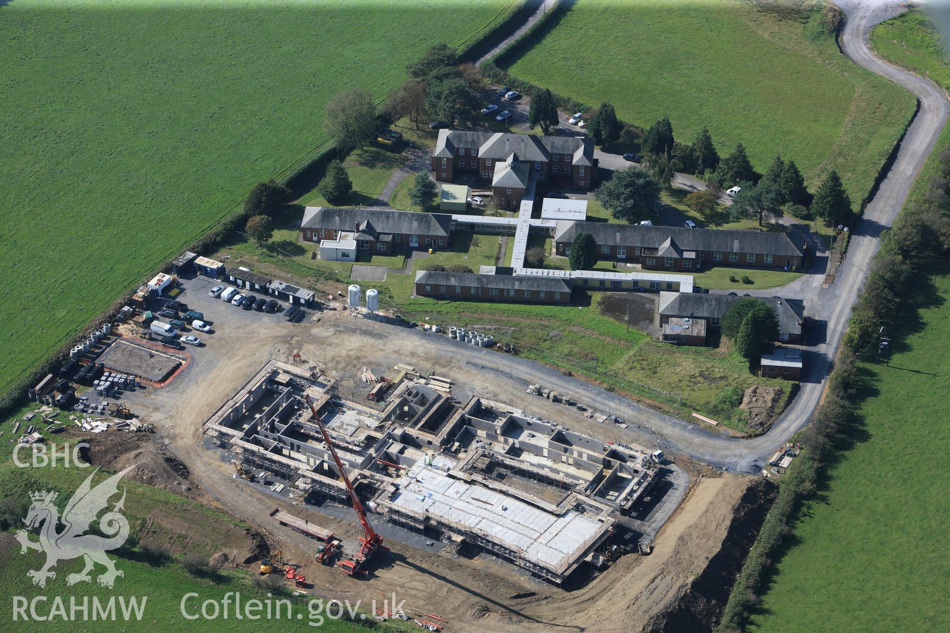 RCAHMW colour oblique photograph of Gwalia Mynydd Mawr, under construction, with Ysbyty Mynydd Mawr, Llannon. Taken by Toby Driver and Oliver Davies on 28/09/2011.