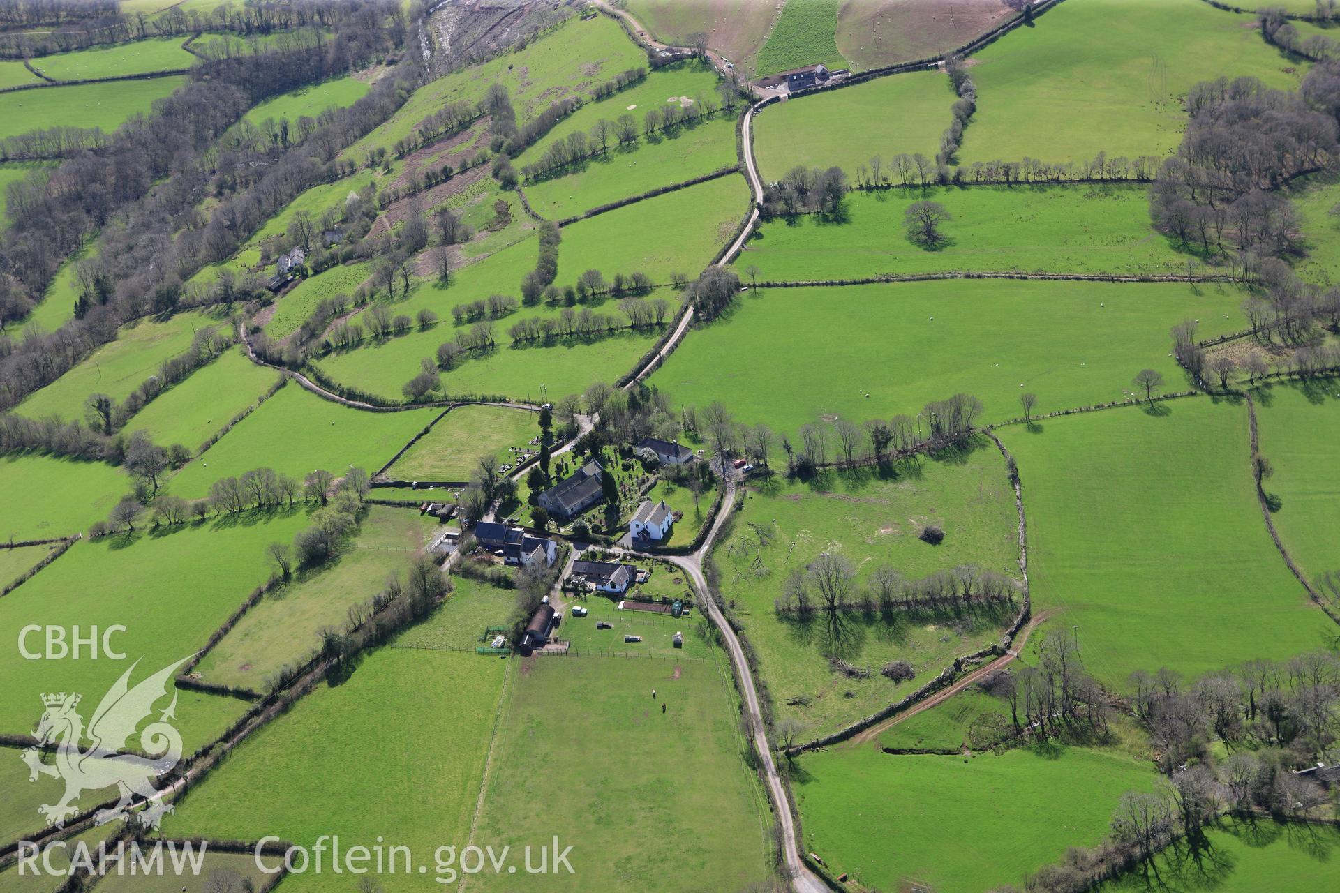 RCAHMW colour oblique photograph of Saints Simono and Jude's Church, Llanddeusant. Taken by Toby Driver on 08/04/2011.