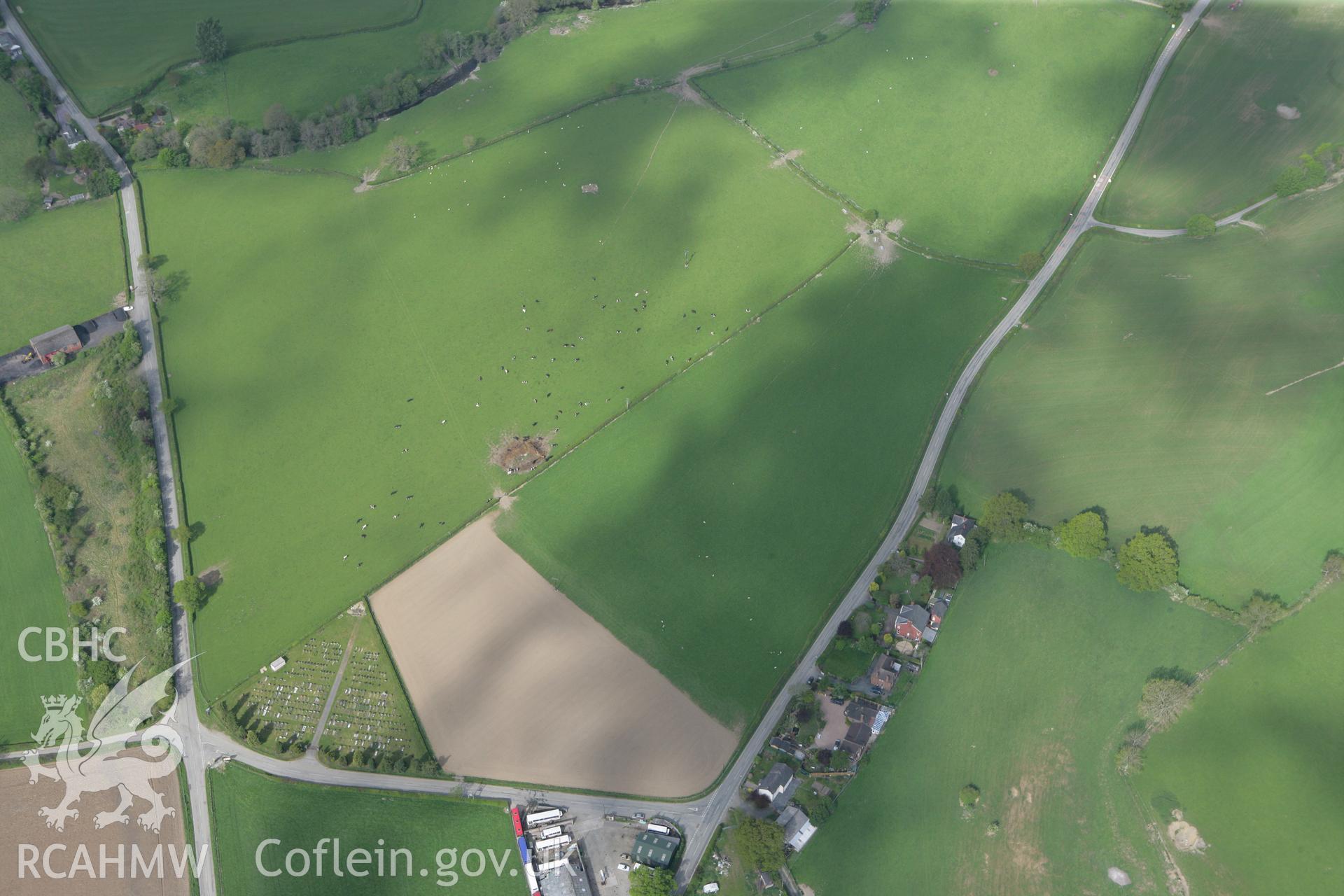 RCAHMW colour oblique photograph of Llanrhaedr-ym-Mochnant cropmarks, west of Meusydd Smithy. Taken by Toby Driver on 03/05/2011.
