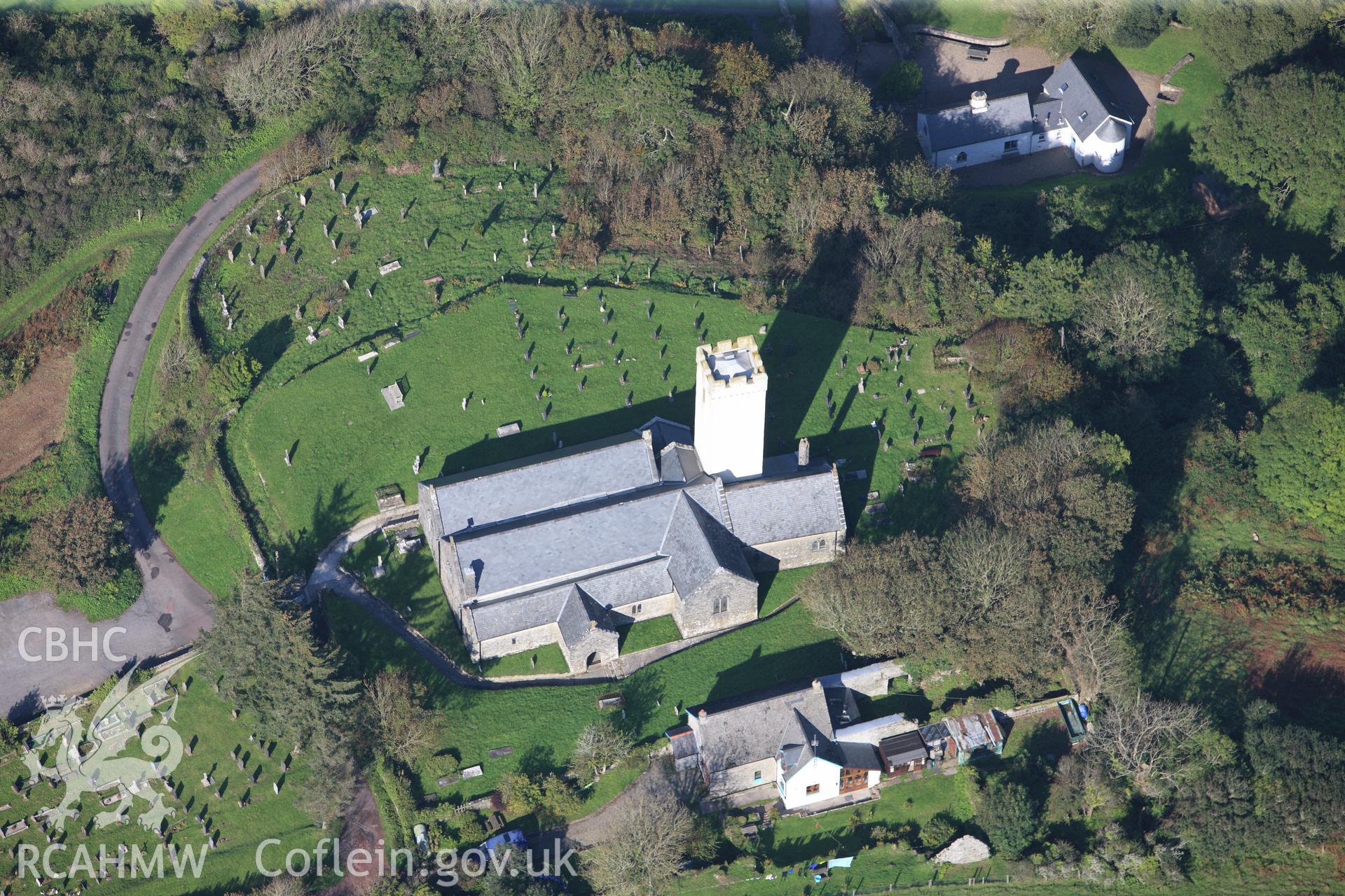RCAHMW colour oblique photograph of St James's Church, Manorbier, viewed from the south. Taken by Toby Driver and Oliver Davies on 28/09/2011.