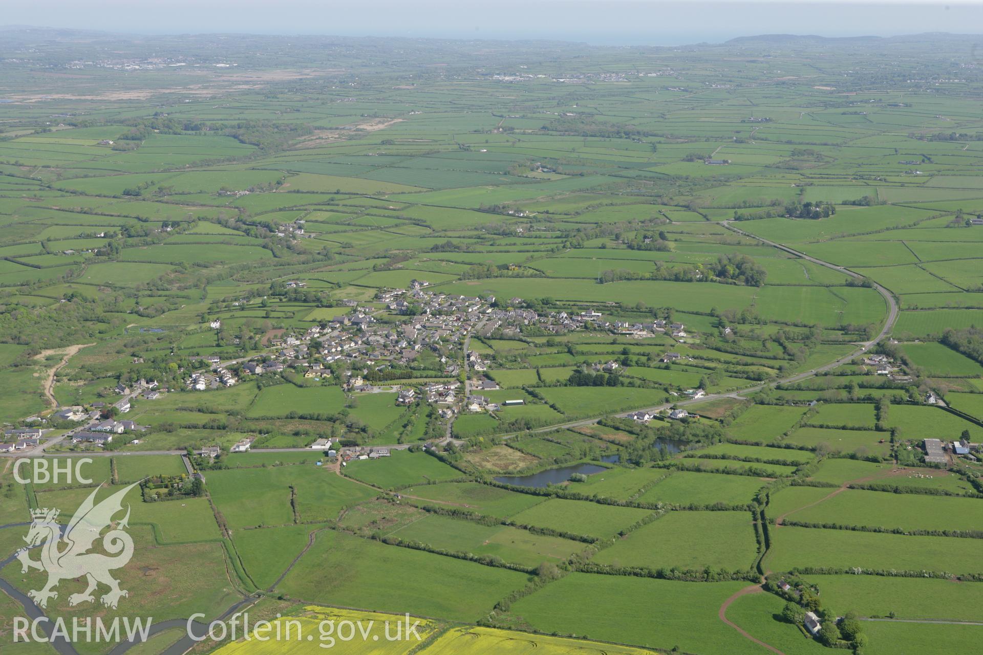 RCAHMW colour oblique photograph of Dwyran, from the south. Taken by Toby Driver on 03/05/2011.