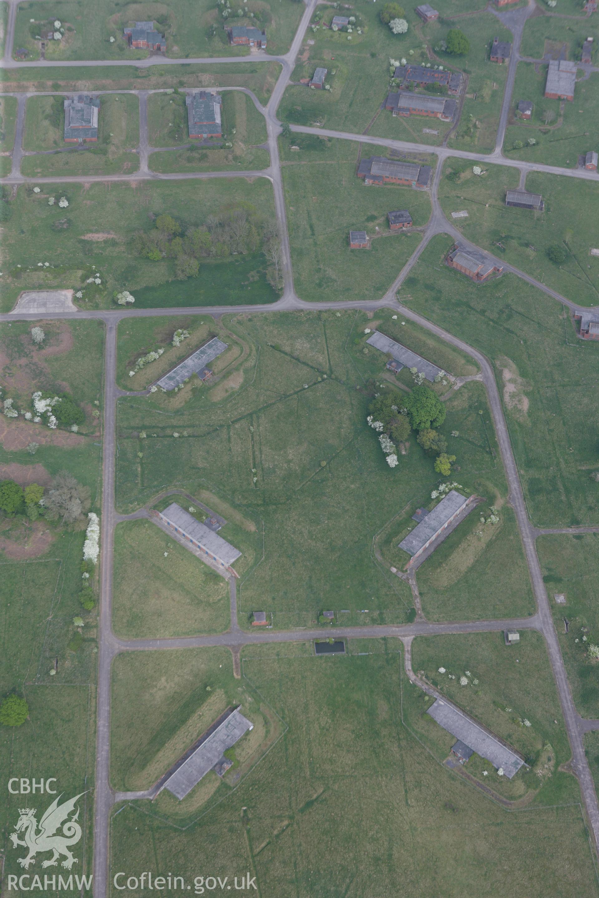 RCAHMW colour oblique photograph of Caerwent, Royal Naval Propellant Factory. Taken by Toby Driver on 26/04/2011.