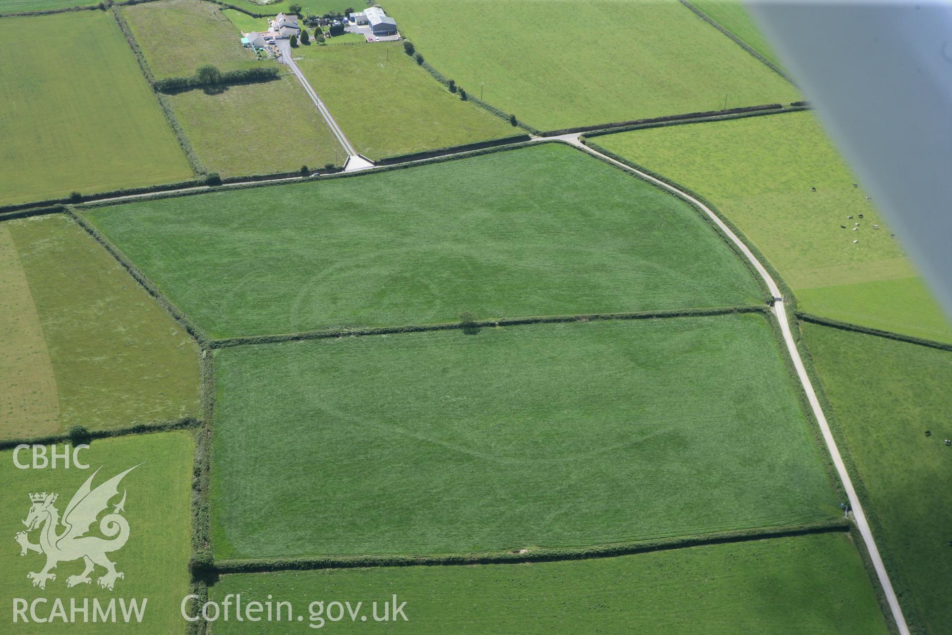 RCAHMW colour oblique photograph of Waunlle cropmark enclosure. Taken by Toby Driver and Oliver Davies on 28/06/2011.