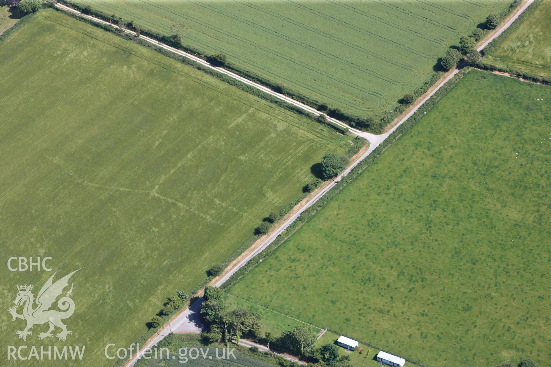 RCAHMW colour oblique photograph of Ffynnon enclosure. Taken by Toby Driver and Oliver Davies on 28/06/2011.