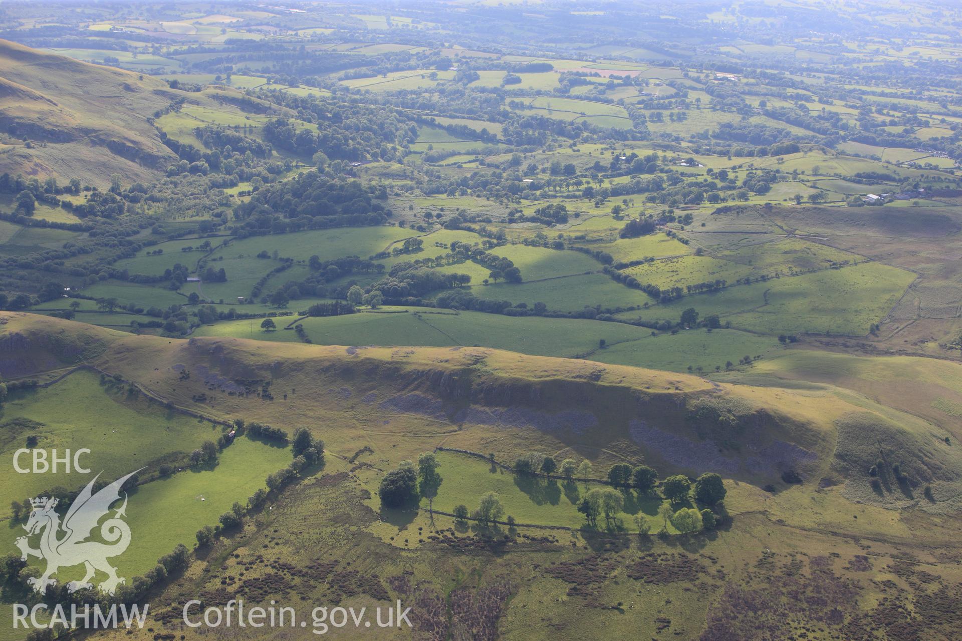 RCAHMW colour oblique photograph of Castle Bank hillfort. Taken by Toby Driver on 13/06/2011.