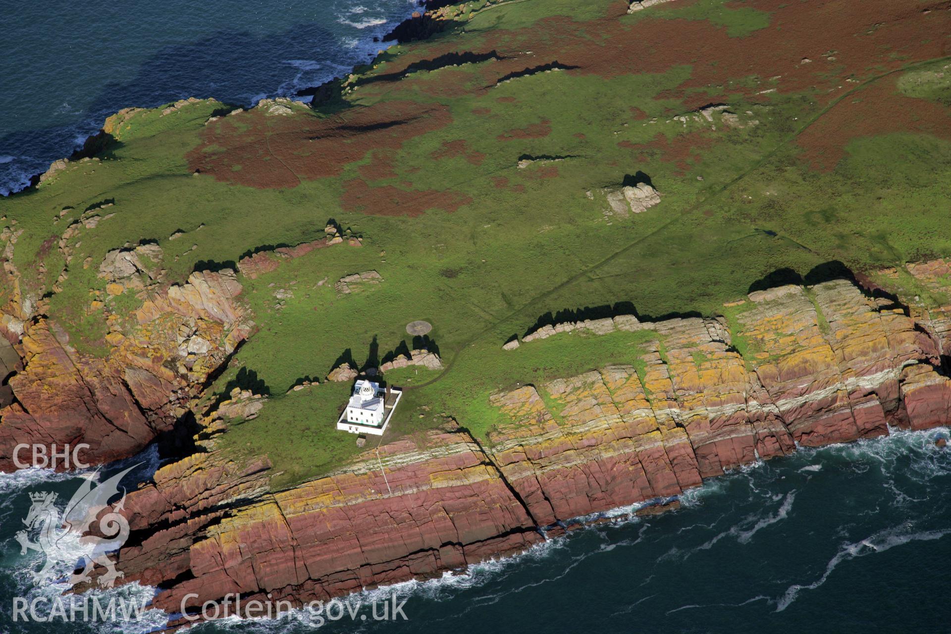 RCAHMW colour oblique photograph of Skokholm Island and lighthouse, viewed from the south-west. Taken by O. Davies & T. Driver on 22/11/2013.