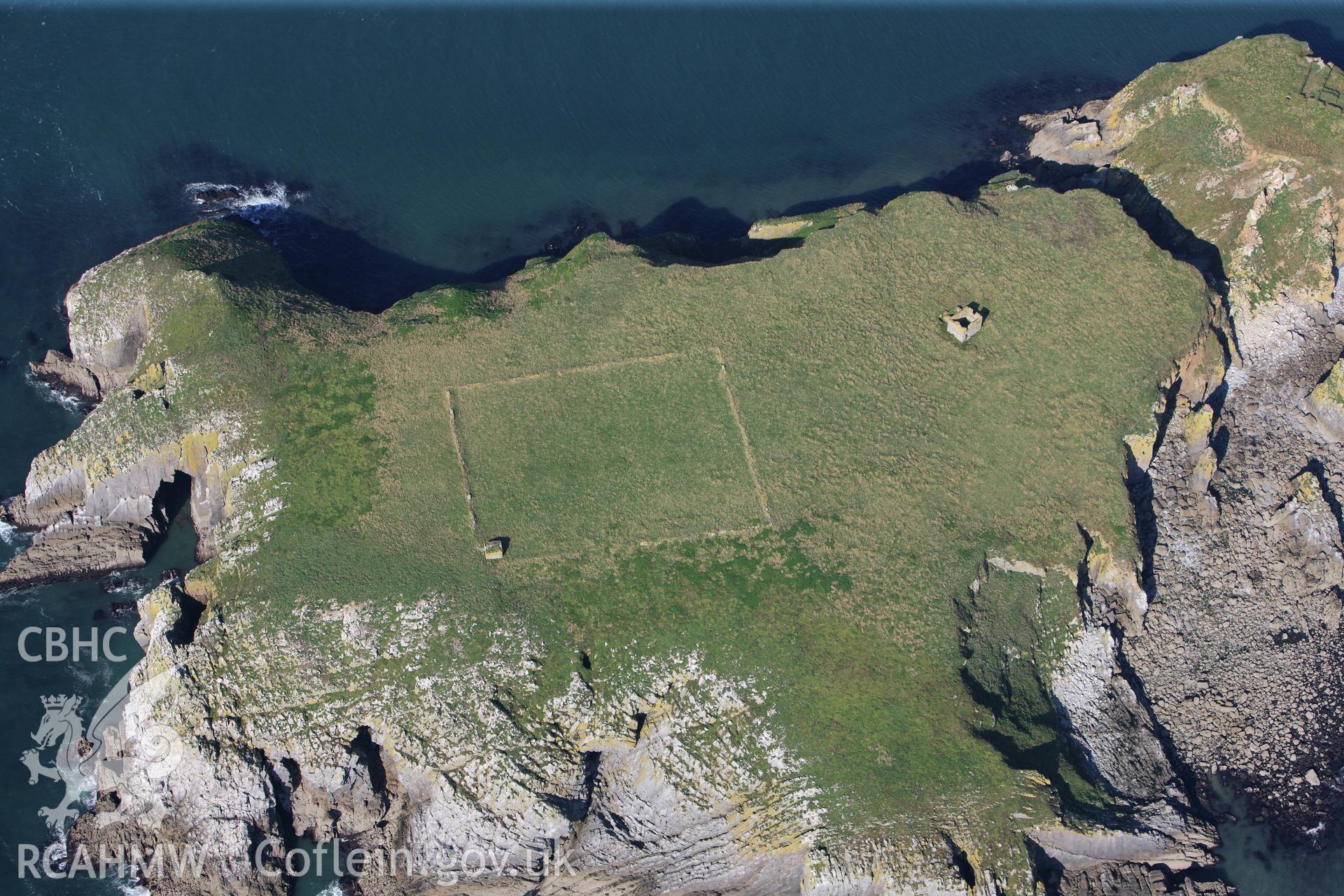RCAHMW colour oblique photograph of chapel ruins and field enclosure, St Margaret's Island, viewed from the south. Taken by Toby Driver and Oliver Davies on 28/09/2011.