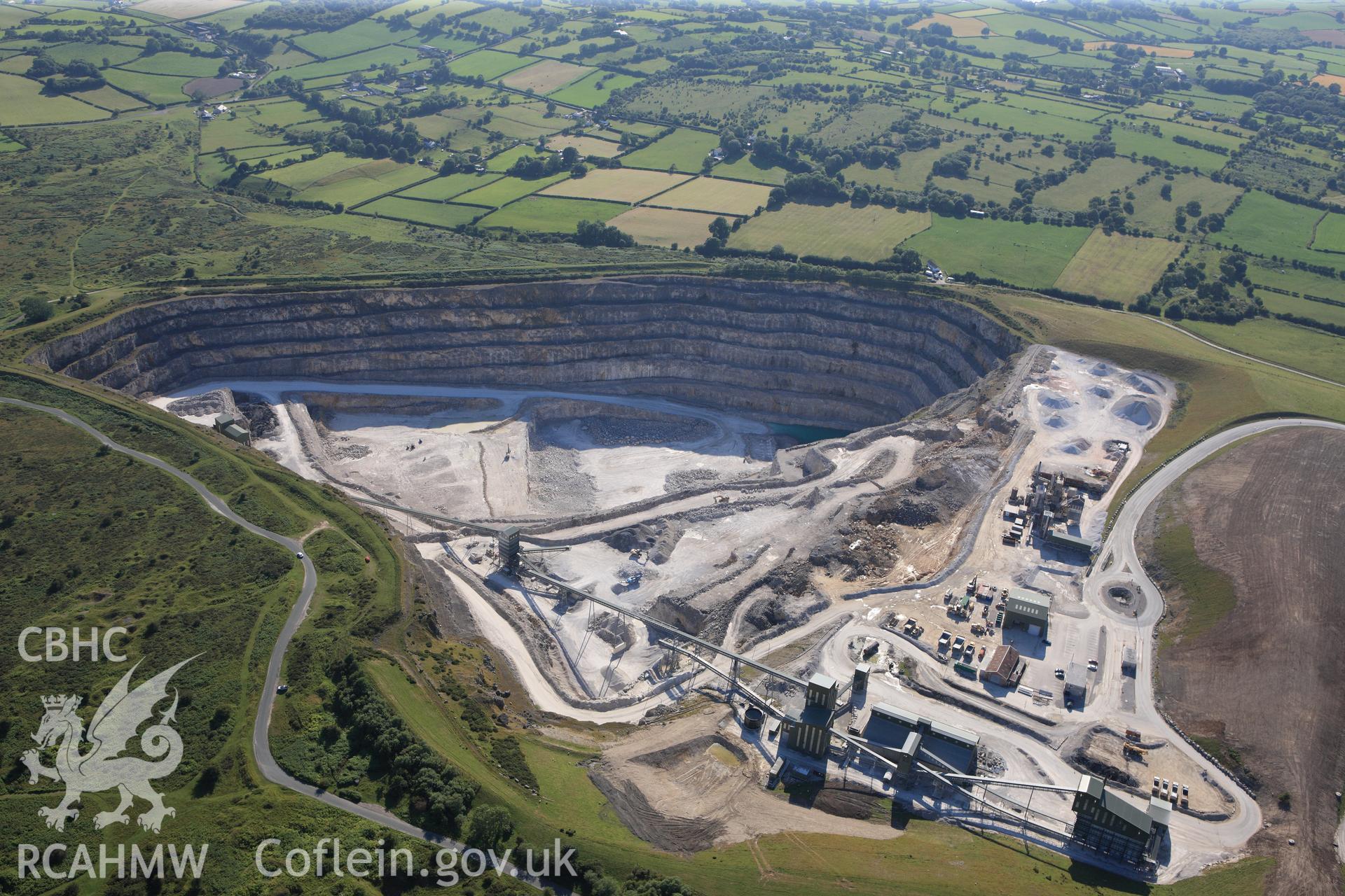 RCAHMW colour oblique photograph of Pant-y-pwll-dwr limestone quarry. Taken by Toby Driver and Oliver Davies on 27/07/2011.
