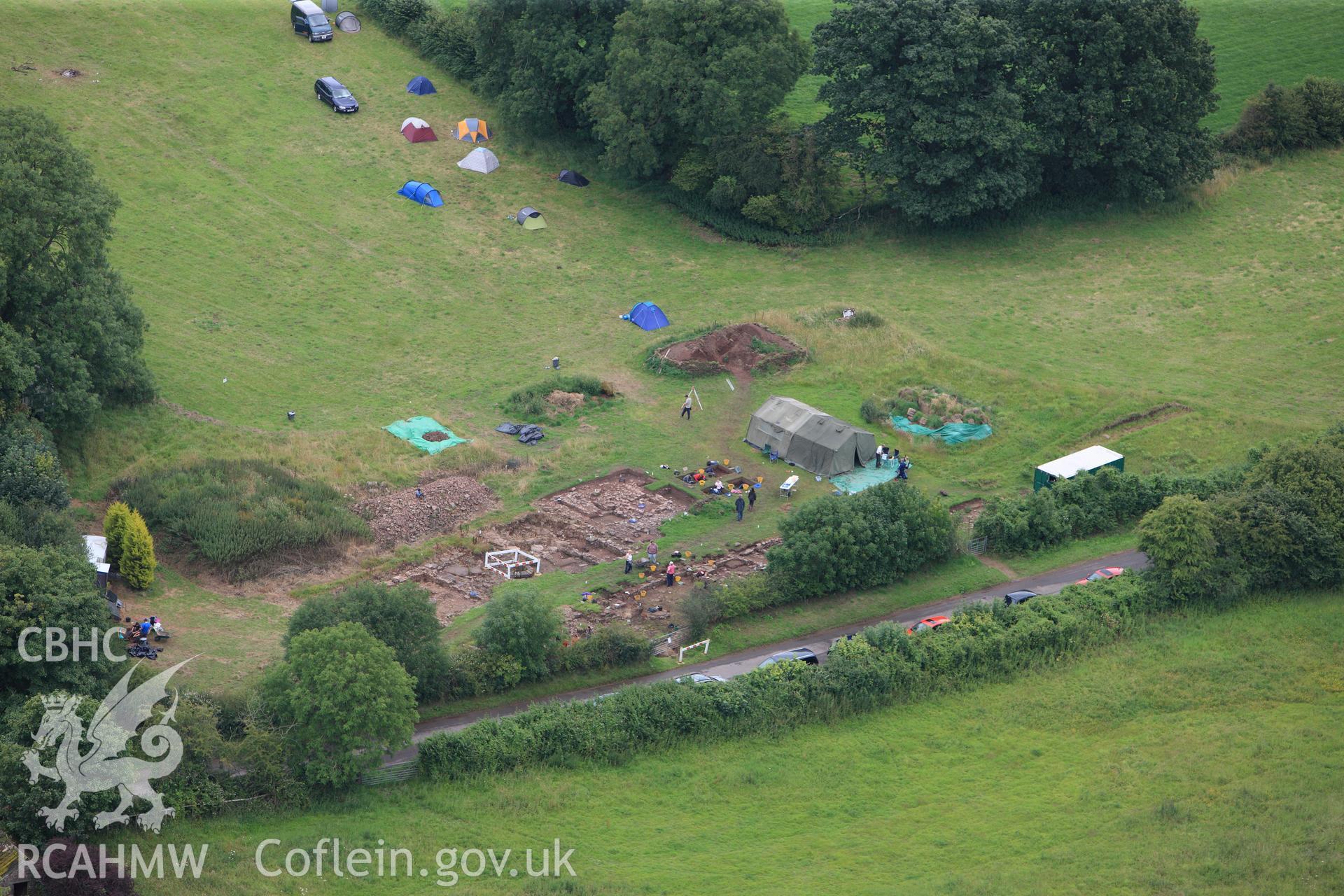 RCAHMW colour oblique photograph of Trellech shrunken medieval village, excavations. Taken by Toby Driver on 20/07/2011.