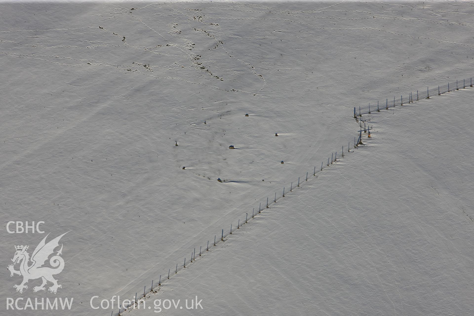 RCAHMW colour oblique photograph of Kerry Hill stone circle, under snow. Taken by Toby Driver on 18/12/2011.