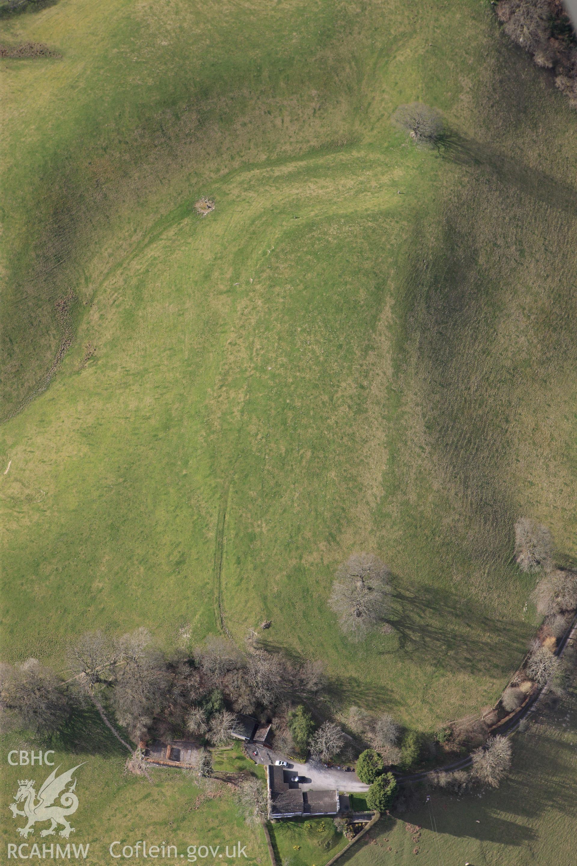 RCAHMW colour oblique photograph of Ty-Gwyn hillfort, ENE of Carno. Taken by Toby Driver on 22/03/2011.