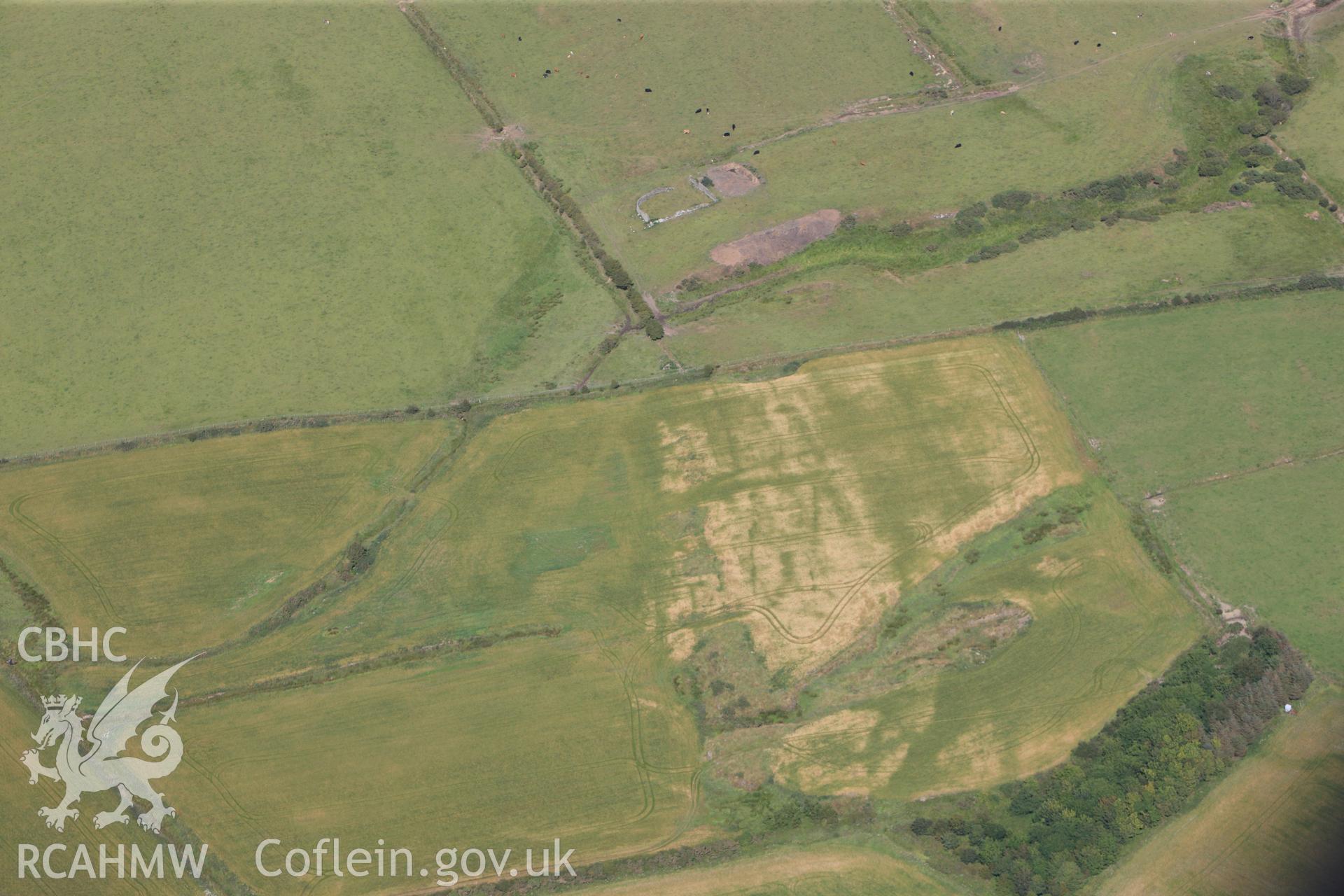 RCAHMW colour oblique photograph of unlocated field near Mynachdy, Non-archaeological cropmarks. Taken by Toby Driver on 20/07/2011.