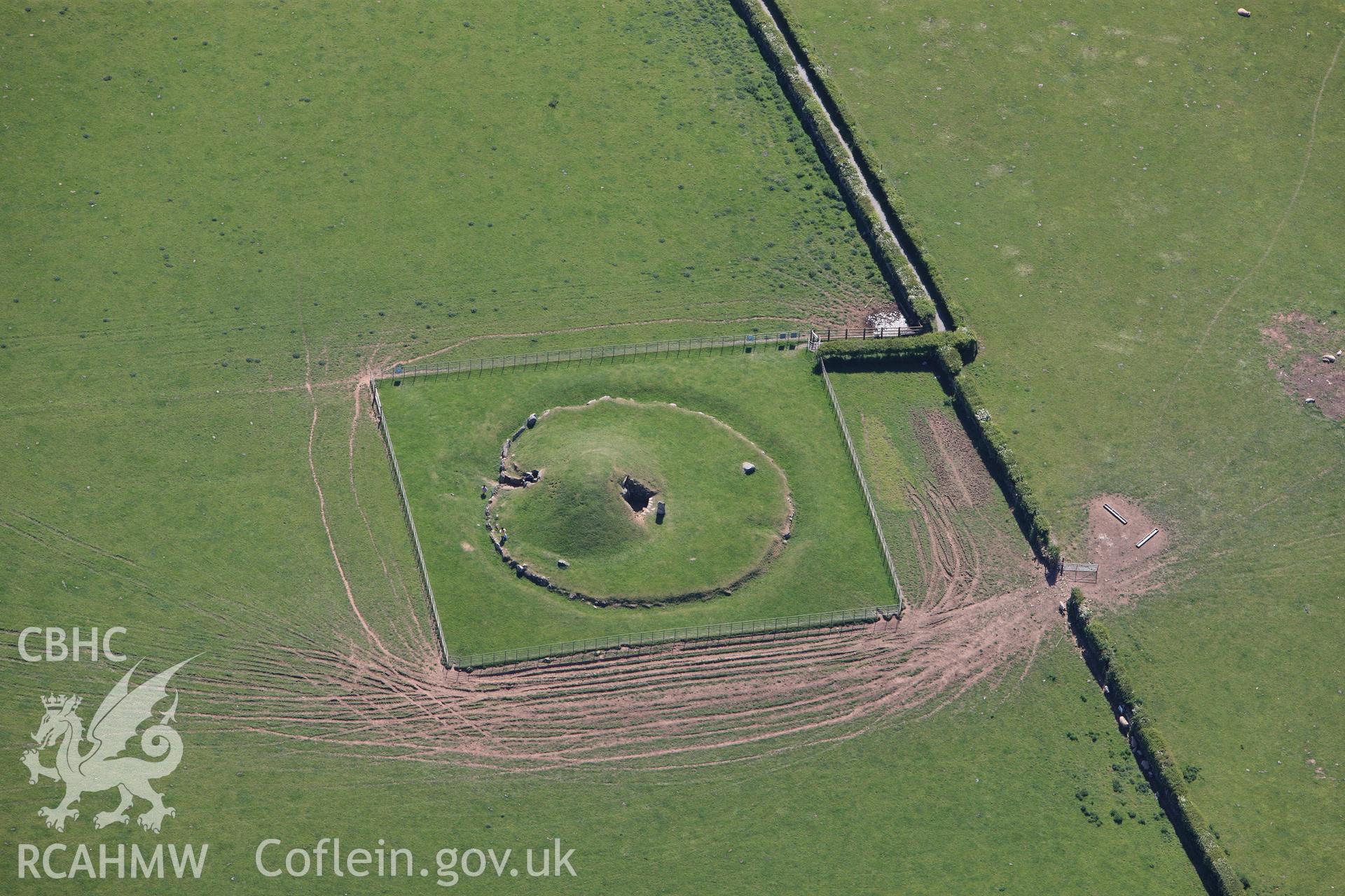 RCAHMW colour oblique photograph of Bryn Celli Ddu Chambered Tomb. Taken by Toby Driver on 03/05/2011.