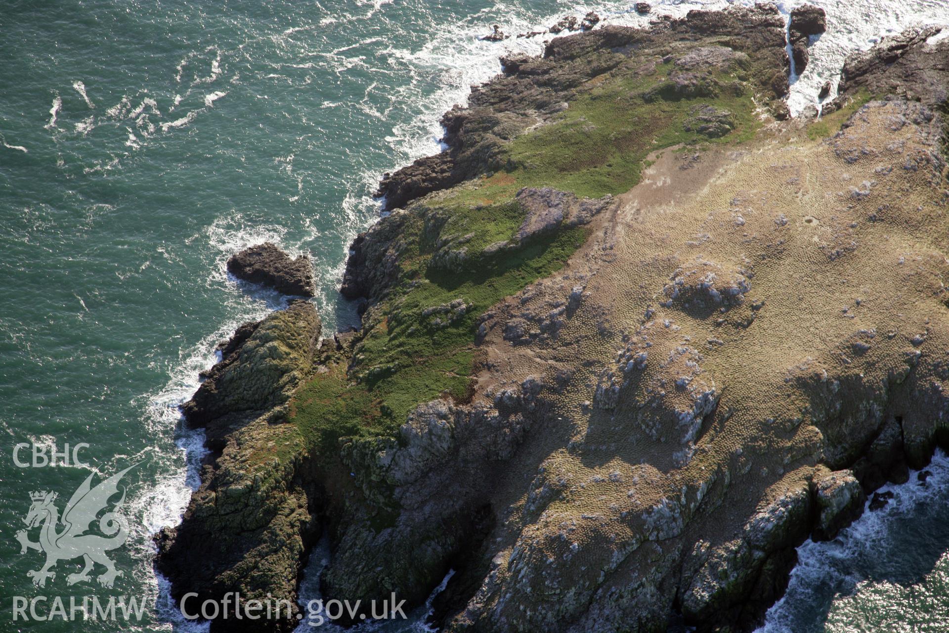RCAHMW colour oblique photograph of Grassholm Island, viewed from the north. Taken by O. Davies & T. Driver on 22/11/2013.