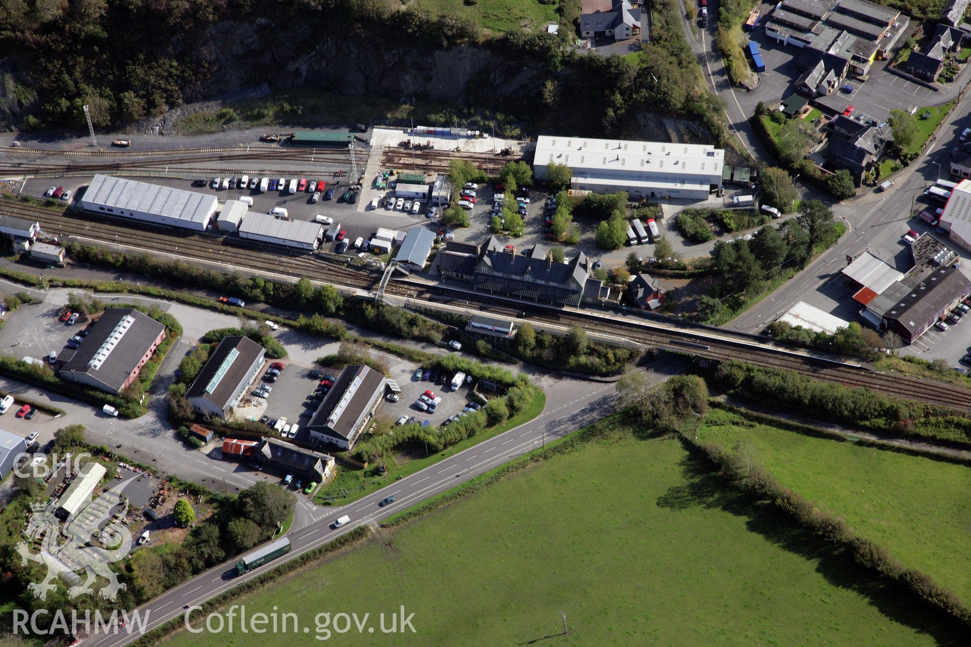 RCAHMW colour oblique photograph of Machynlleth Railway Station, Cambrian Coast Line. Taken by Oliver Davies on 29/09/2011.