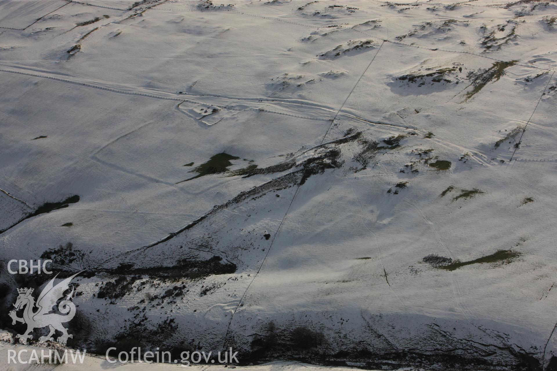 RCAHMW colour oblique photograph of Cefn Goleu enclosure 1, view looking south. Taken by Toby Driver on 18/12/2011.
