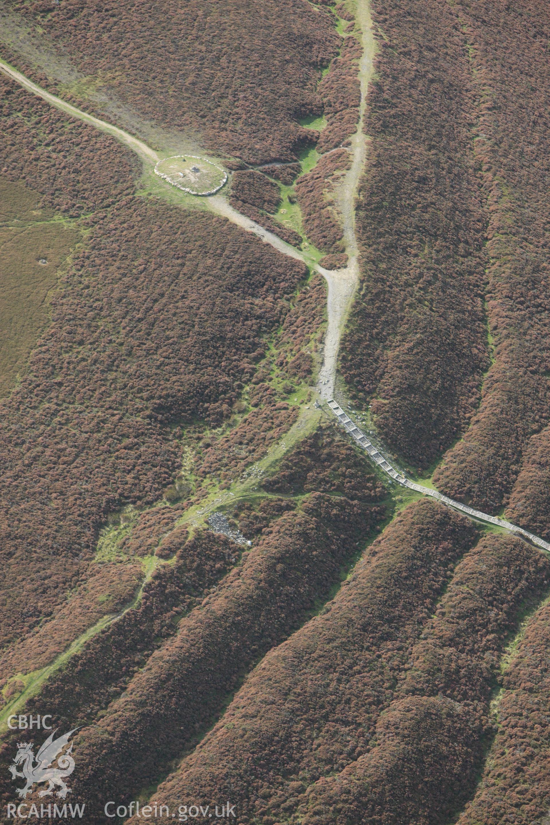 RCAHMW colour oblique photograph of Penycloddiau Cairn. Taken by Toby Driver on 04/10/2011.