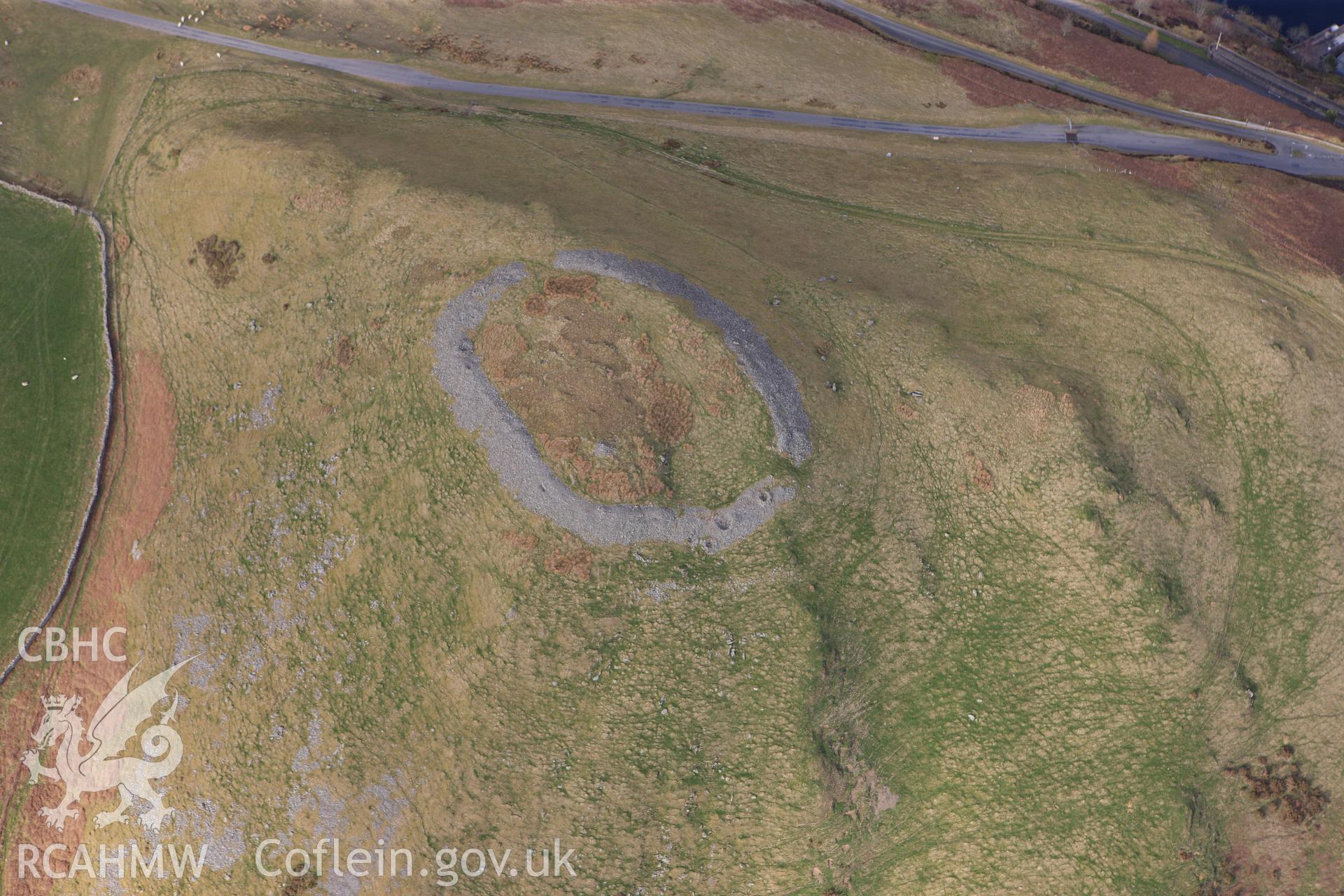 RCAHMW colour oblique photograph of Pen-y-Gaer, Llanidloes. Taken by Toby Driver on 22/03/2011.
