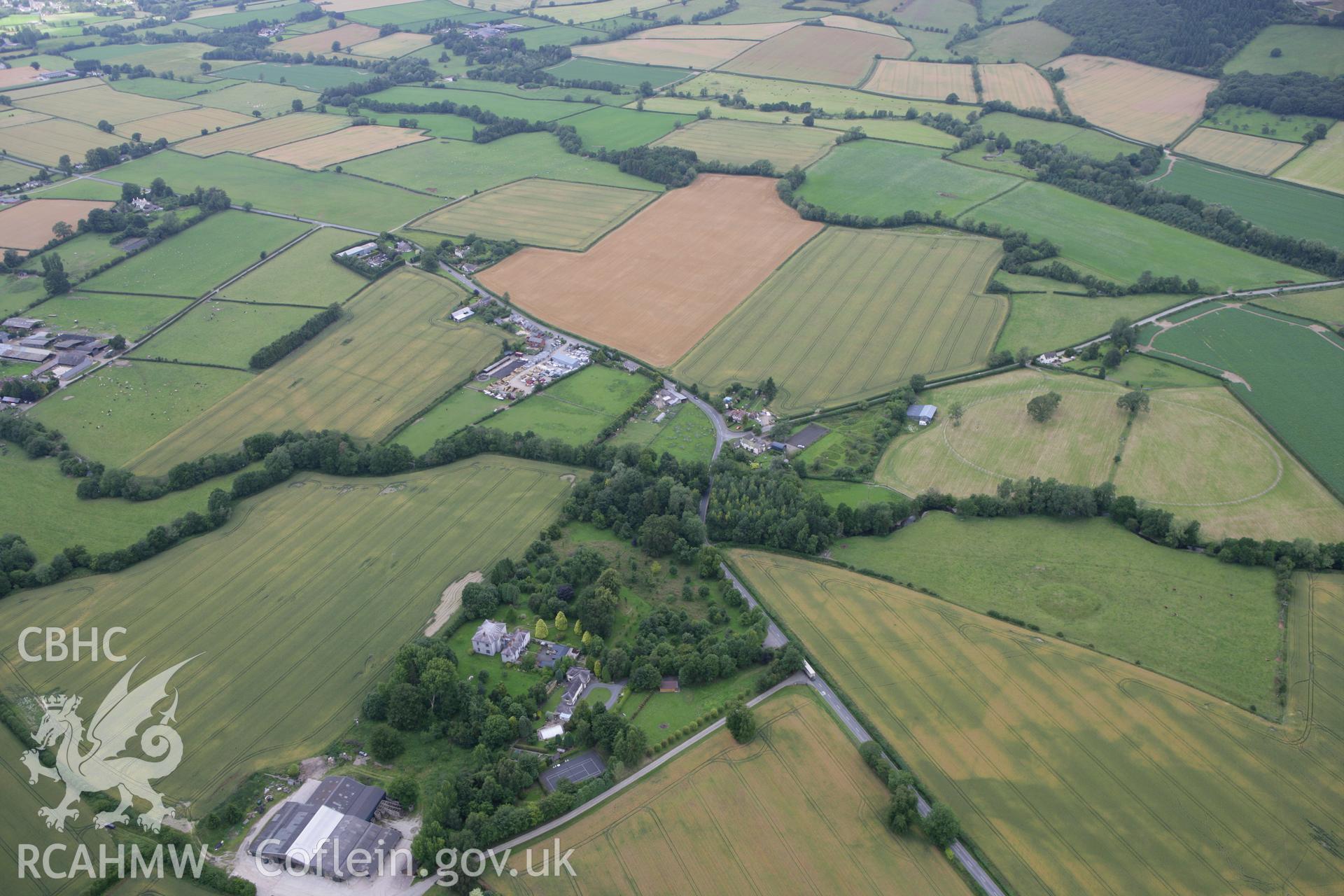RCAHMW colour oblique photograph of Broadheath Roman villa, general view of cropmarks. Taken by Toby Driver on 20/07/2011.