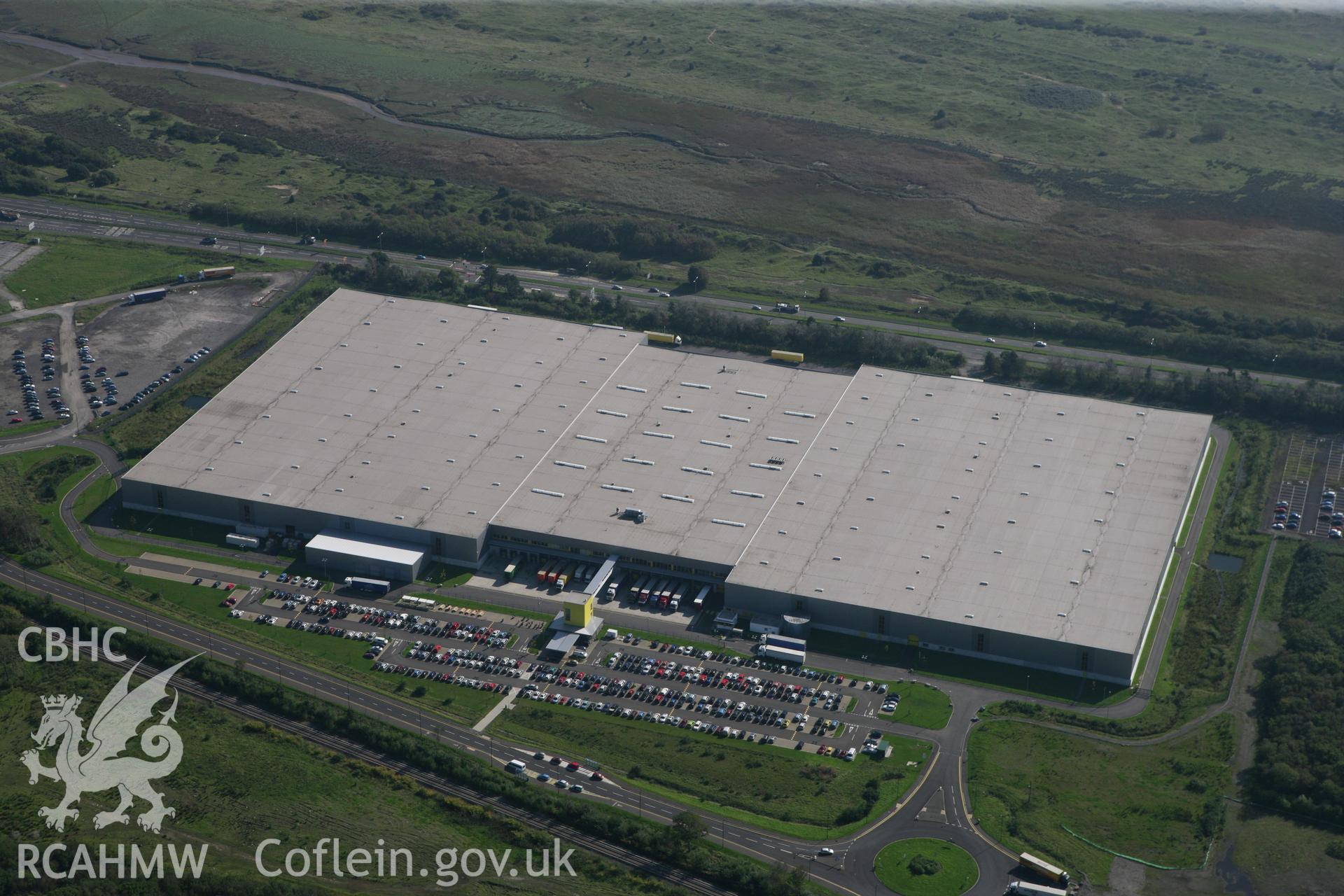 RCAHMW colour oblique photograph of the Amazon distribution centre, Swansea Bay. Taken by Toby Driver and Oliver Davies on 28/09/2011.