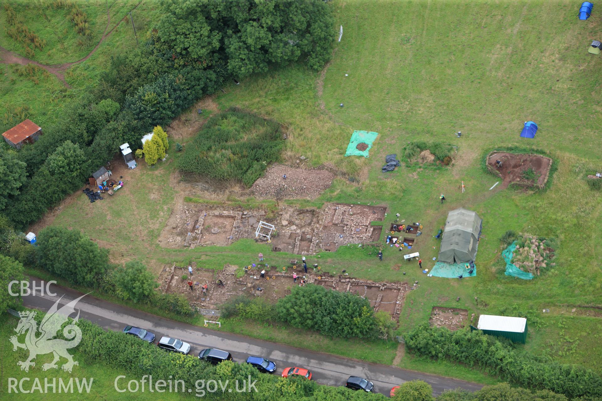 RCAHMW colour oblique photograph of Trellech shrunken medieval village, excavations. Taken by Toby Driver on 20/07/2011.