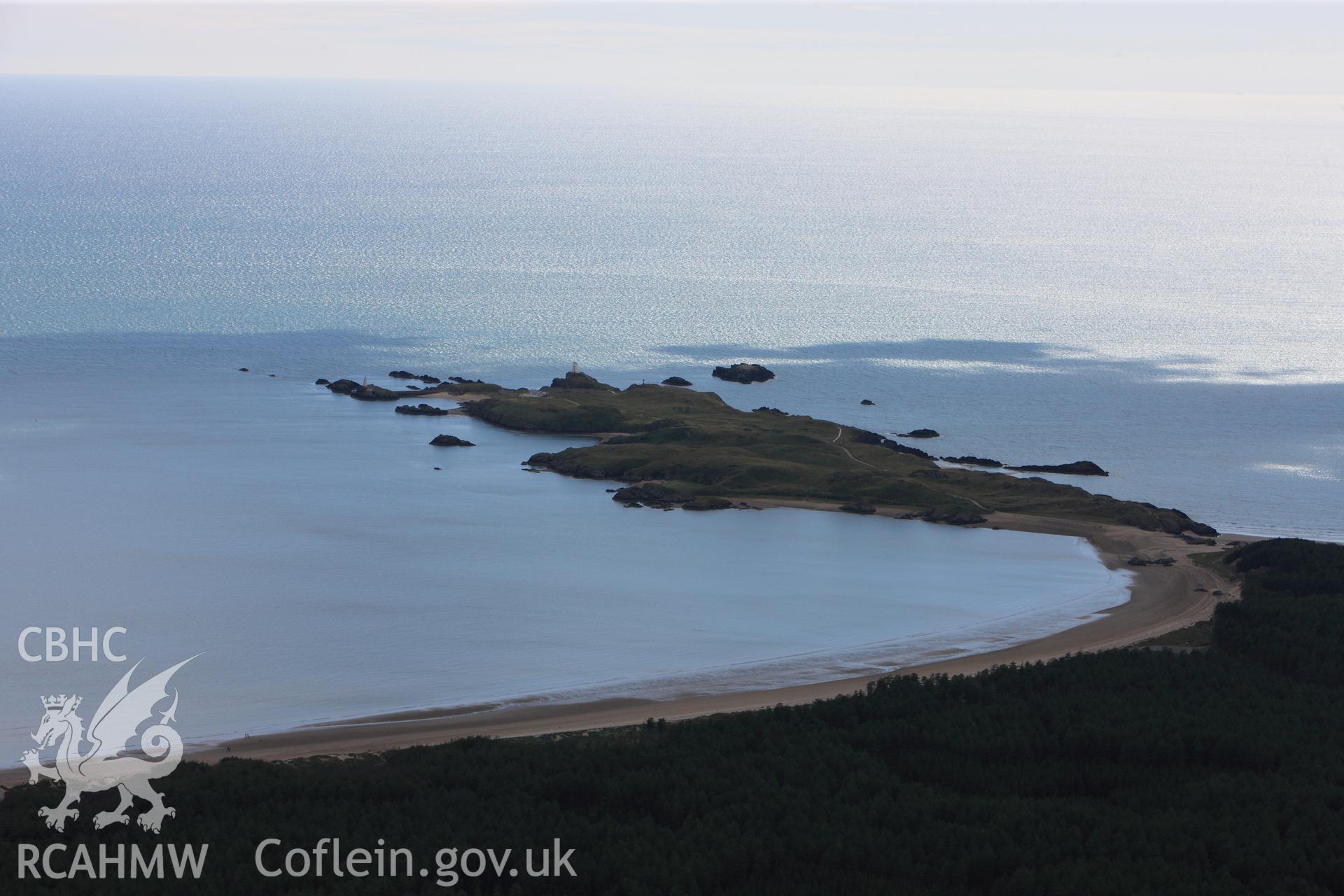 RCAHMW colour oblique photograph of Llanddwyn Island and lighthouse, view from east. Taken by Toby Driver on 20/07/2011.