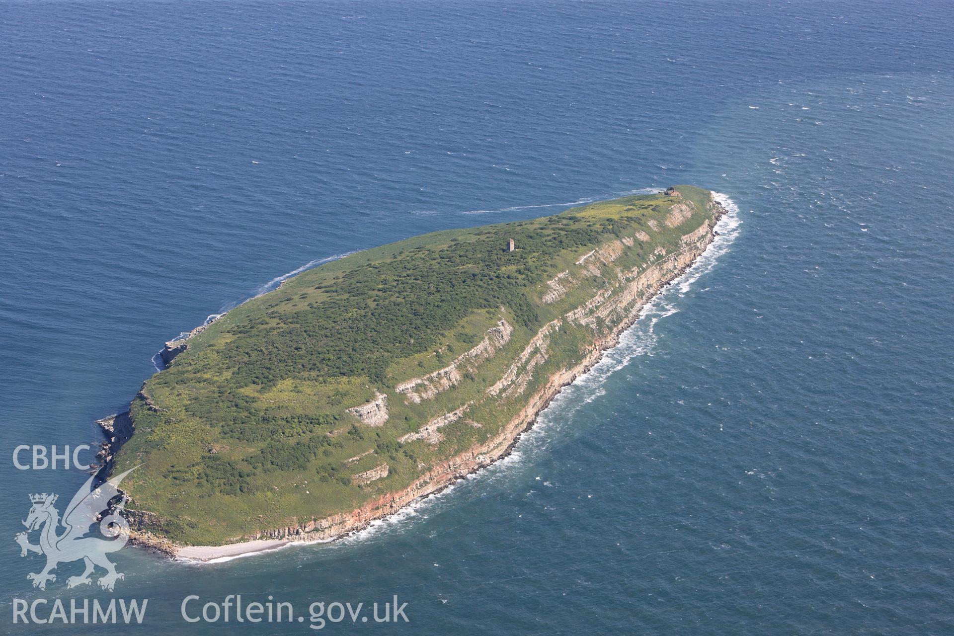 RCAHMW colour oblique photograph of Puffin Island, with cell of Penmon Priory. Taken by Toby Driver on 03/05/2011.