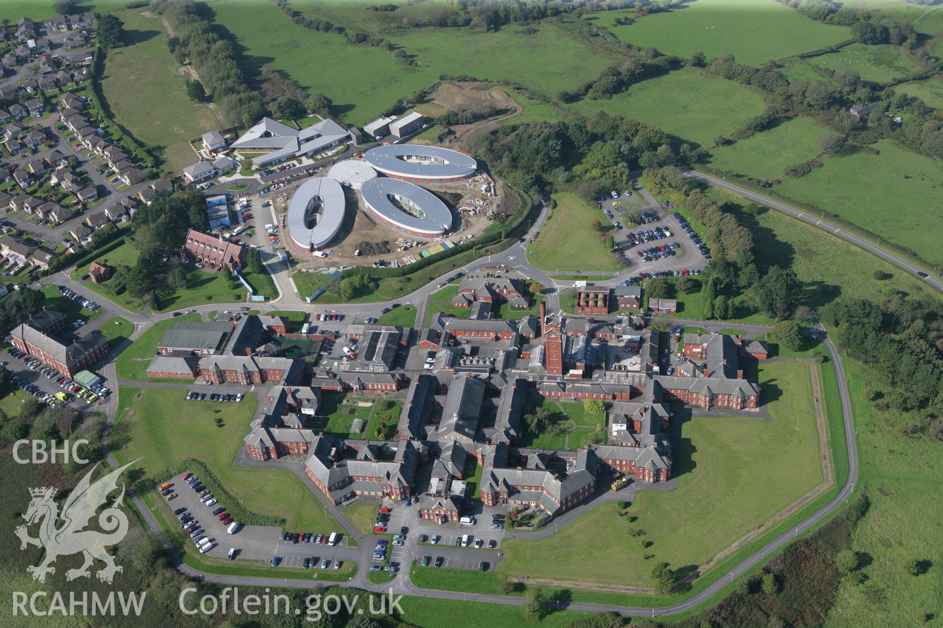 RCAHMW colour oblique photograph of Cefn Coed Hospital with new dementia unit, viewed from the south-east. Taken by Toby Driver and Oliver Davies on 28/09/2011.