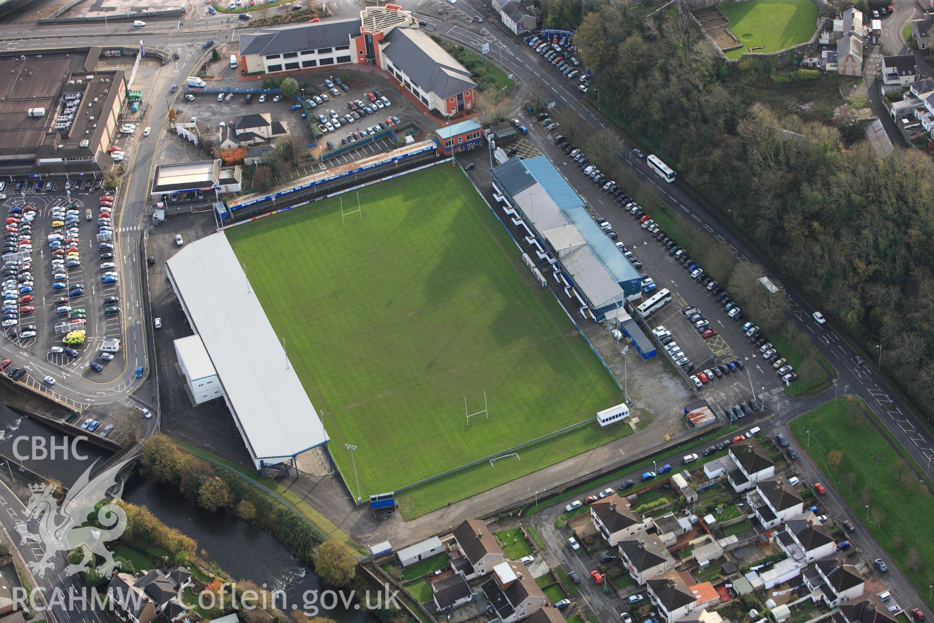 RCAHMW colour oblique photograph of Brewery Field Stadium, Bridgend. Taken by Toby Driver on 17/11/2011.