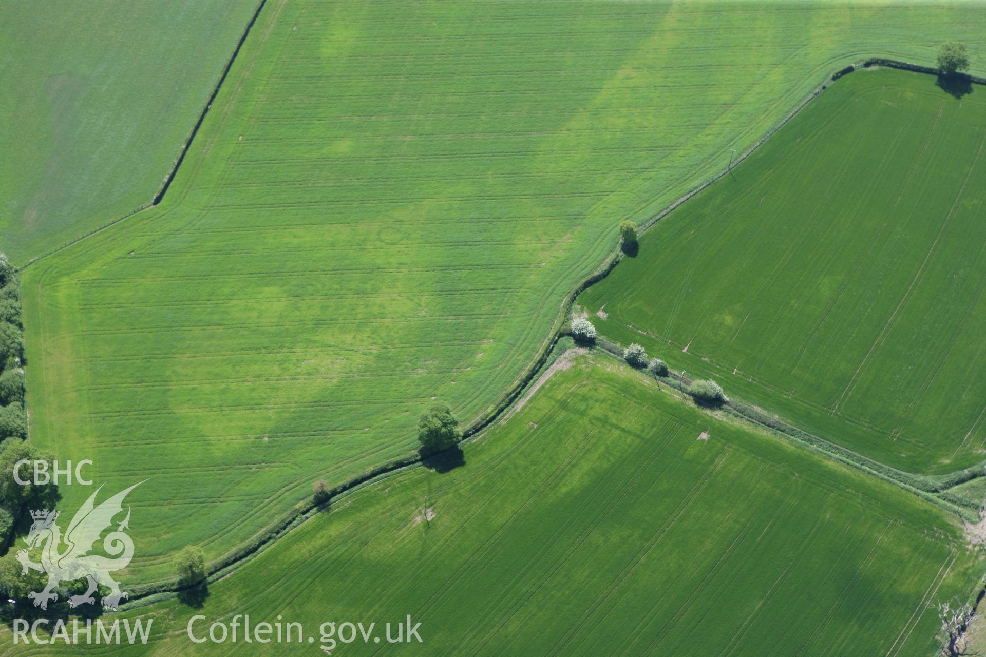 RCAHMW colour oblique photograph of Gerwyn-Fechan Round Barrow Cemetery. Taken by Toby Driver on 03/05/2011.
